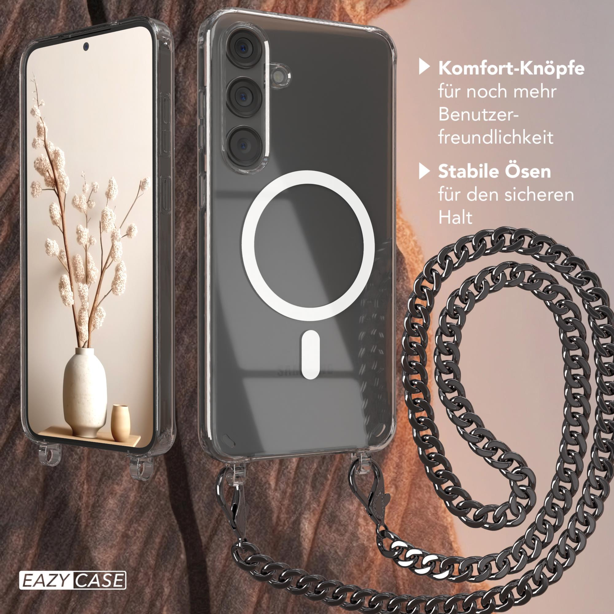 Telefon mit Hülle und Kette. Weißer Kreis auf der Rückseite. Vase und Blumen links.
