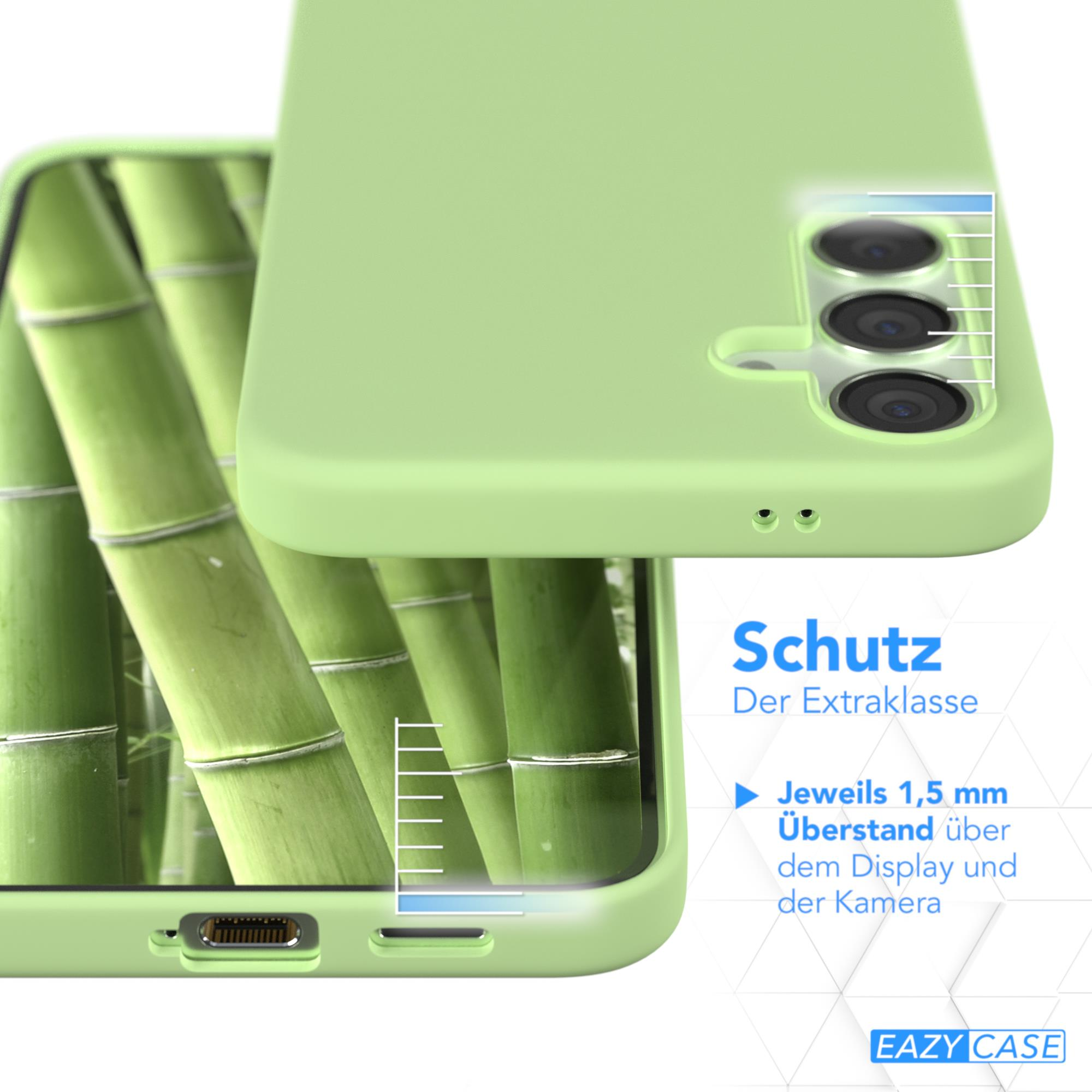 Grüne Handyhülle. Zeigt Bambus im Hintergrund.