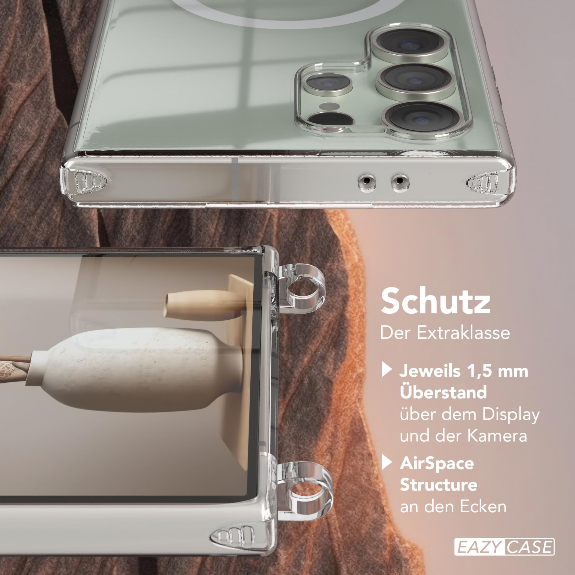 Nahaufnahme einer durchsichtigen Handyhülle mit Telefon. Schutzstruktur mit erhöhten Kanten für Display und Kamera.