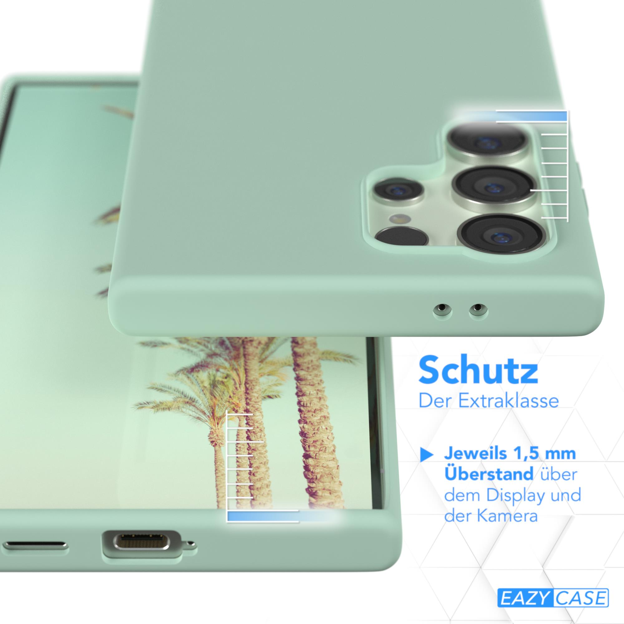 Nahaufnahme einer Handyhülle mit Telefon, mit 1,5 mm Überstand. Grünliche Hülle und eine Palme im Hintergrund.