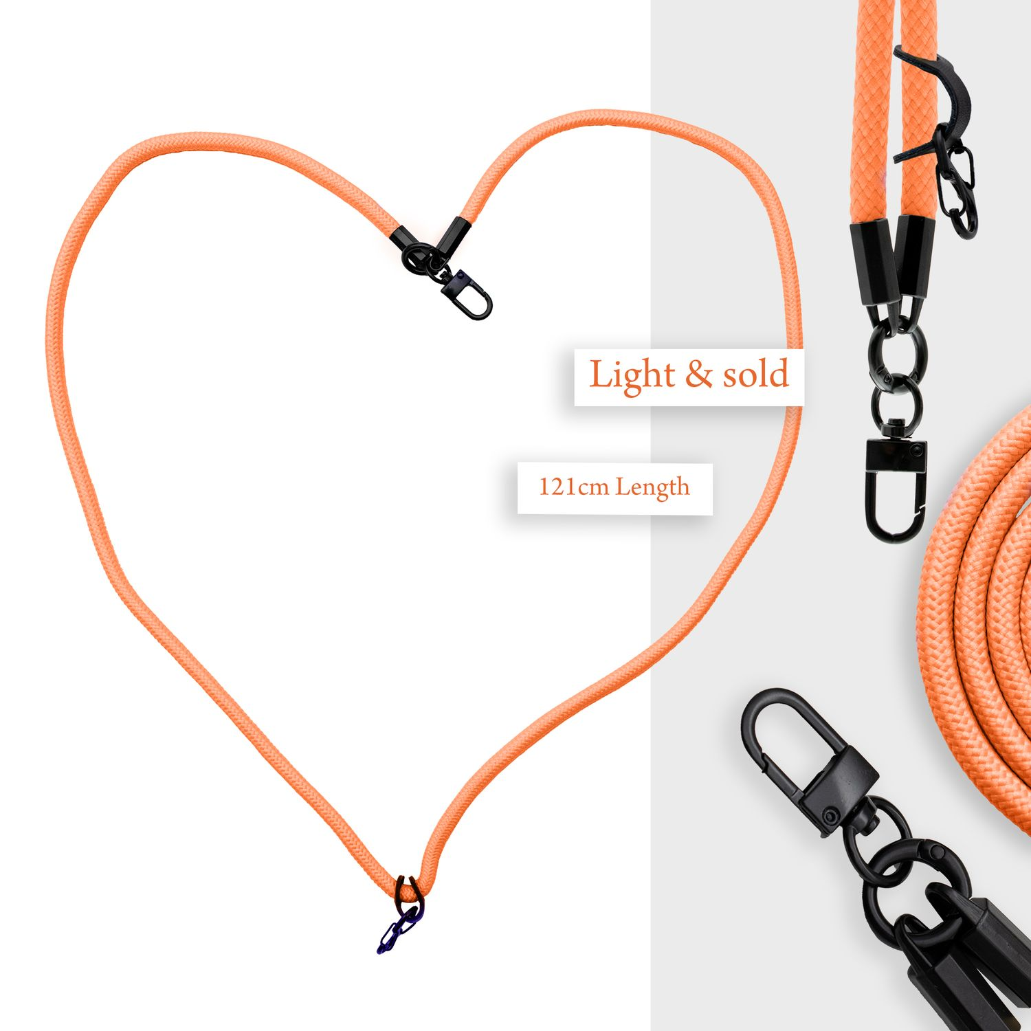 Oranges Schlüsselband in Herzform. Schwarze Verschlüsse. Text: "Light & sold", "121cm Length".