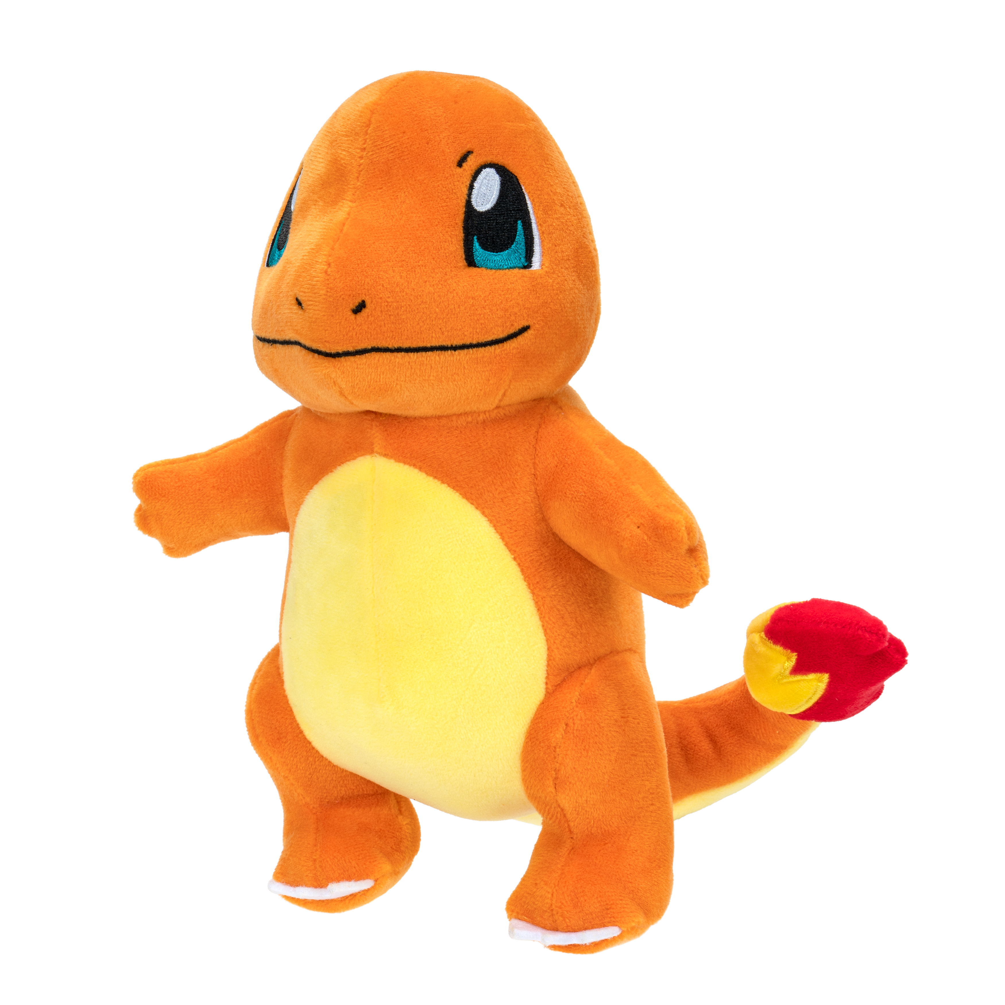 Oranges Charmander-Plüschtier. Gelber Bauch, roter Schwanz und blaue Augen.