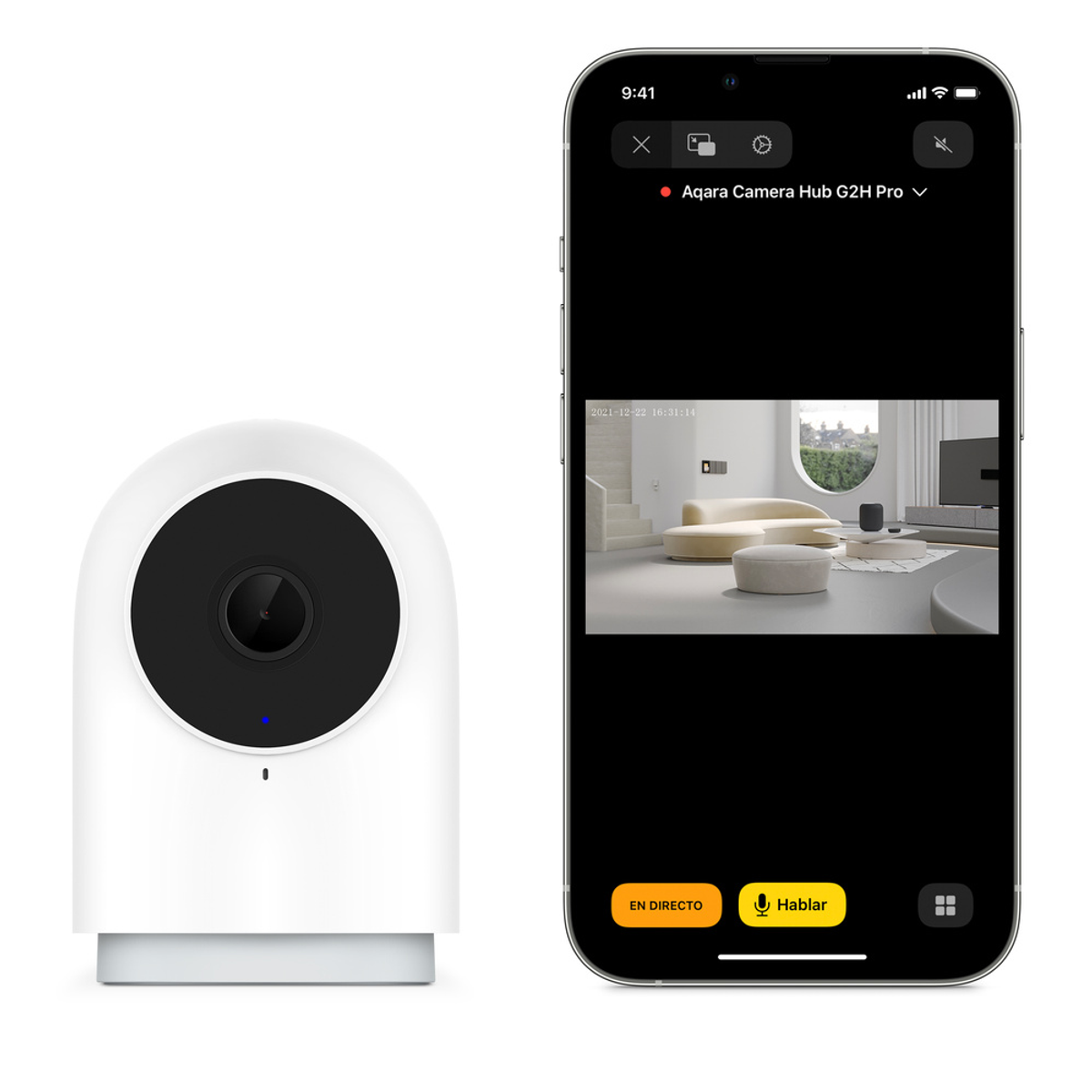 Biała kamera bezpieczeństwa obok ekranu telefonu z transmisją wideo na żywo z domu.
