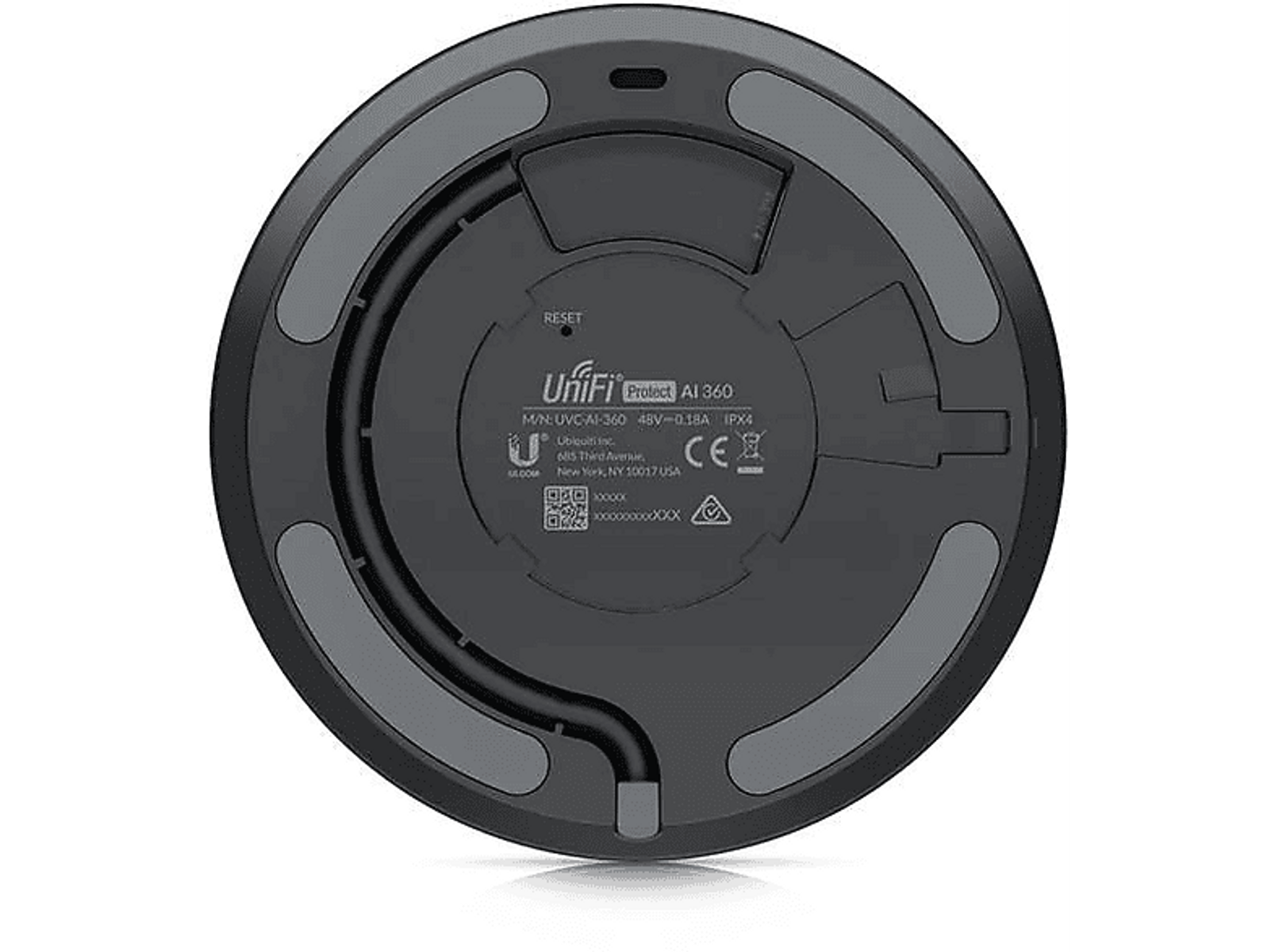 Czarna, okrągła podstawa urządzenia z etykietami, przyciskami i połączeniem kablowym.