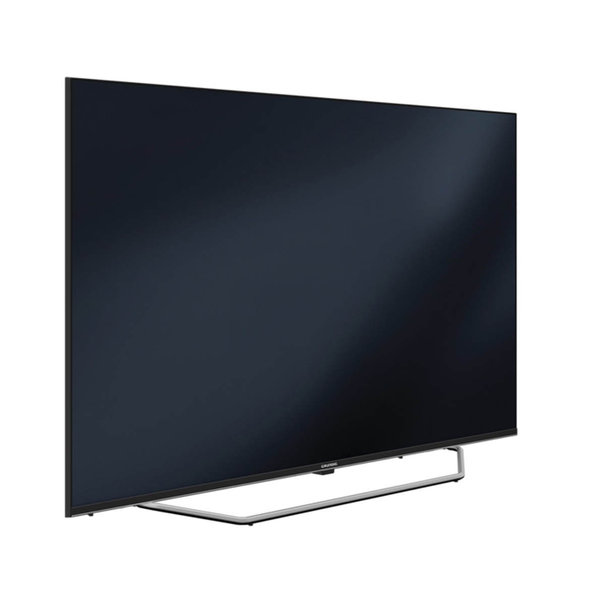 Se muestra un televisor negro grande y elegante con un soporte plateado.