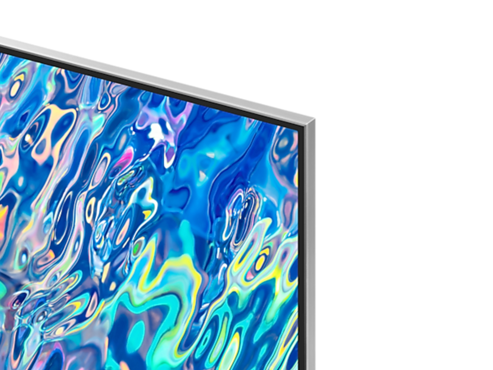 Telewizor jest zamontowany na białej ścianie, wyświetlając kolorowy obraz.