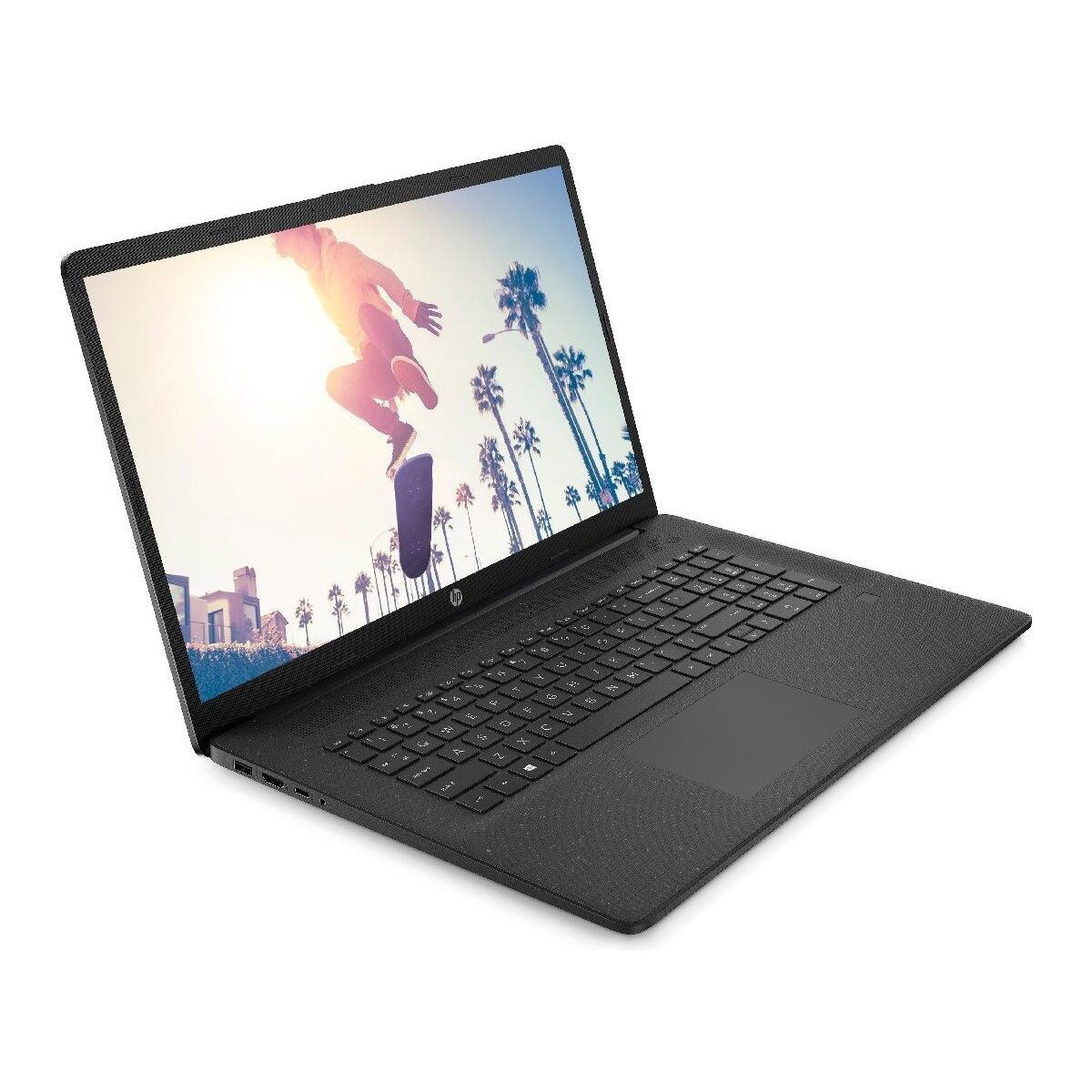Laptop geöffnet, zeigt eine Person, die vor Palmen und einem sonnigen Himmel skateboardet.