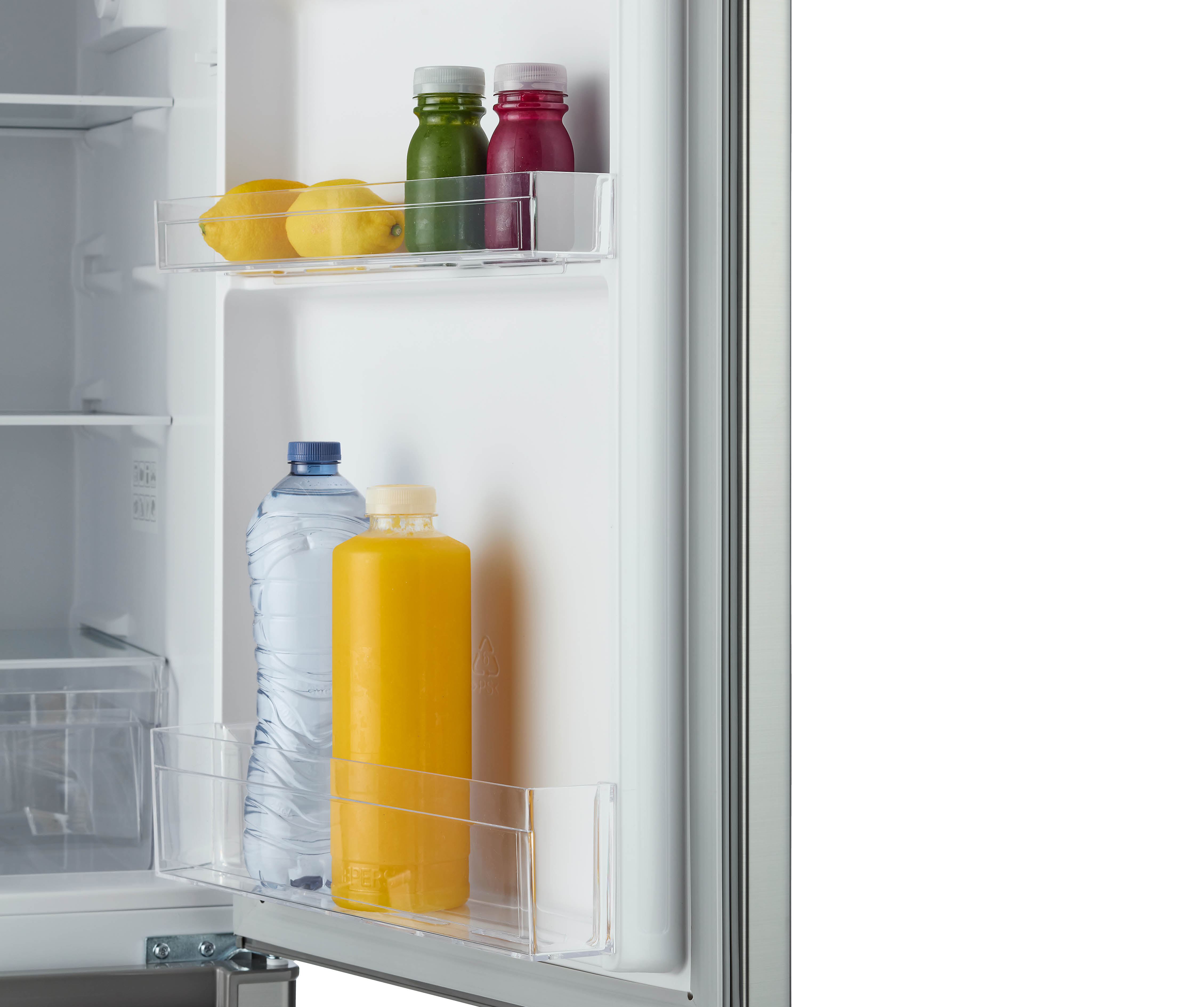 Refrigerator interior with bottles. Shows fruits, juice, and water bottles.