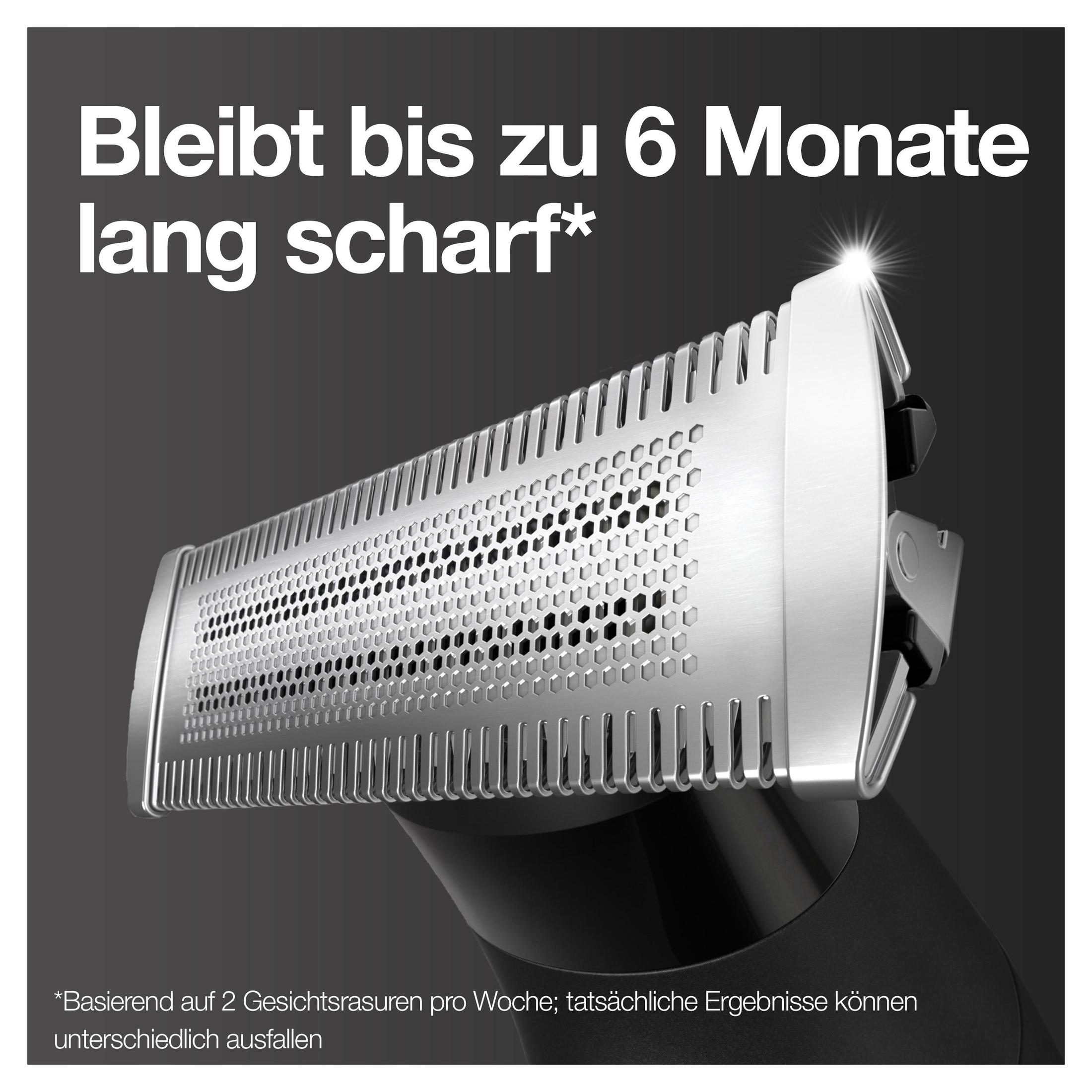 Nahaufnahme eines Rasiererkopfes. Der Rasiererkopf ist silber und schwarz.