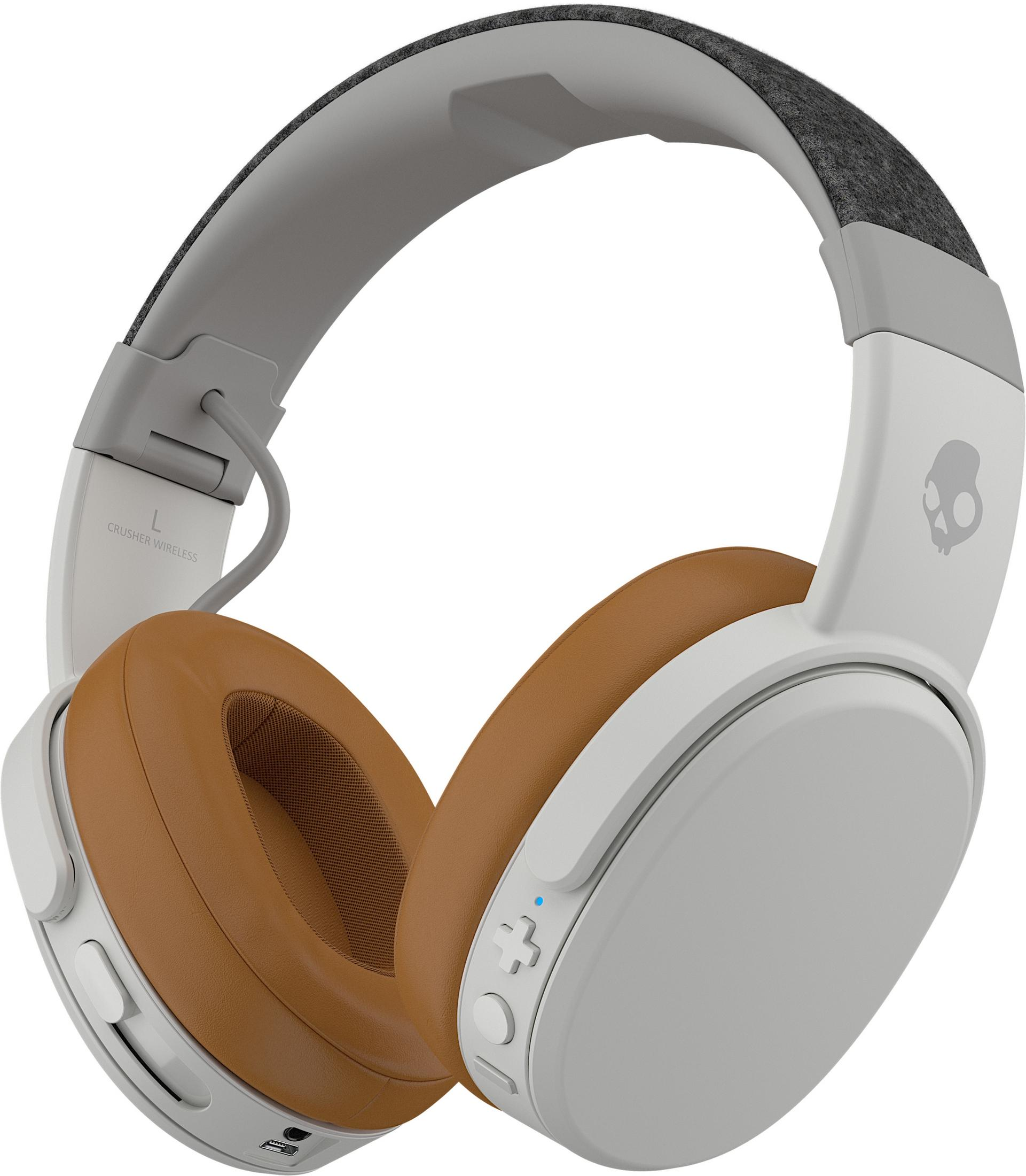 Weiße und graue Skullcandy Crusher Wireless-Kopfhörer. Braune Ohrmuscheln, weiße Akzente.