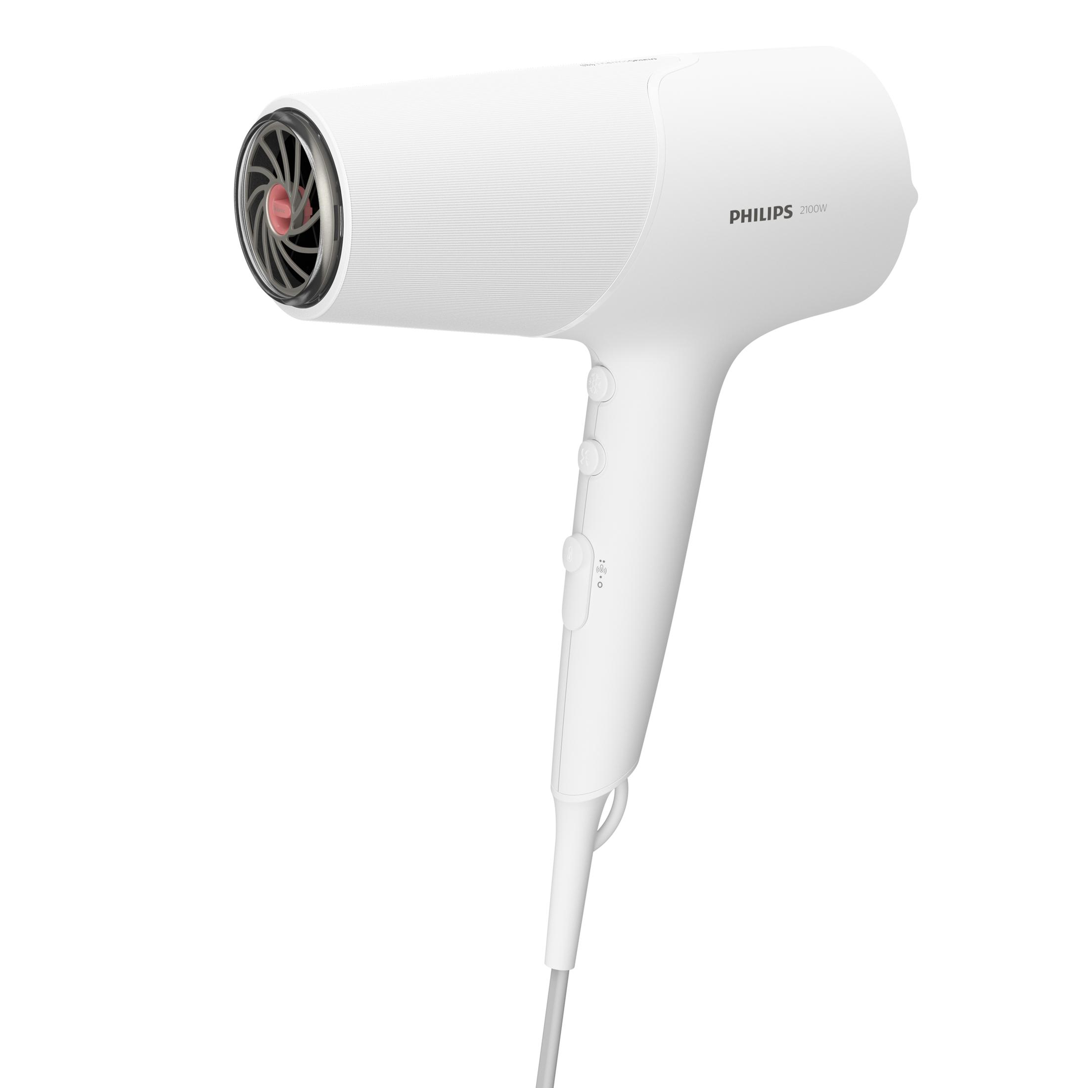 Biała suszarka do włosów Philips. Ma trzy przyciski i kabel.
