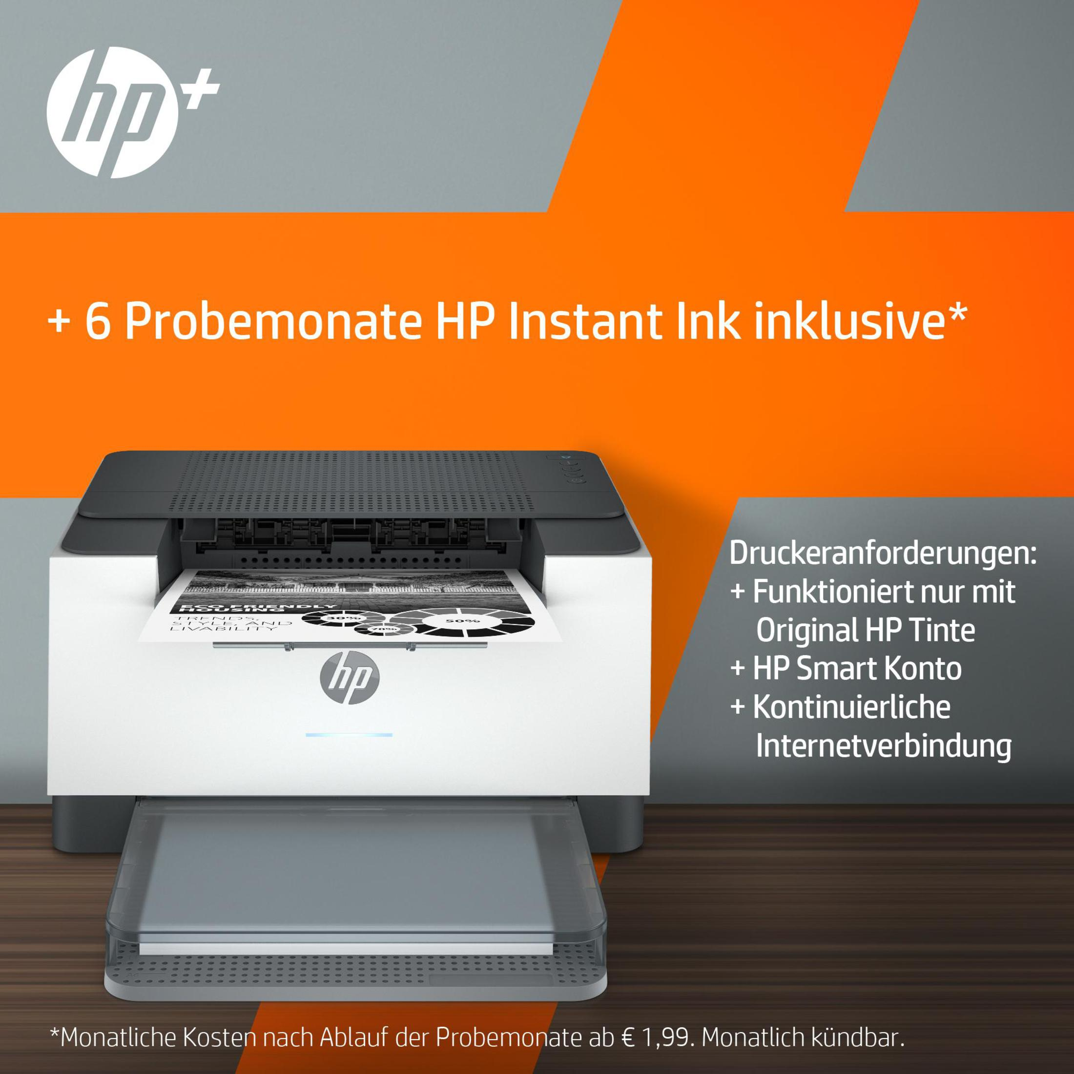 Drukarka z podajnikiem papieru i tekstem promocyjnym o HP Instant Ink.
