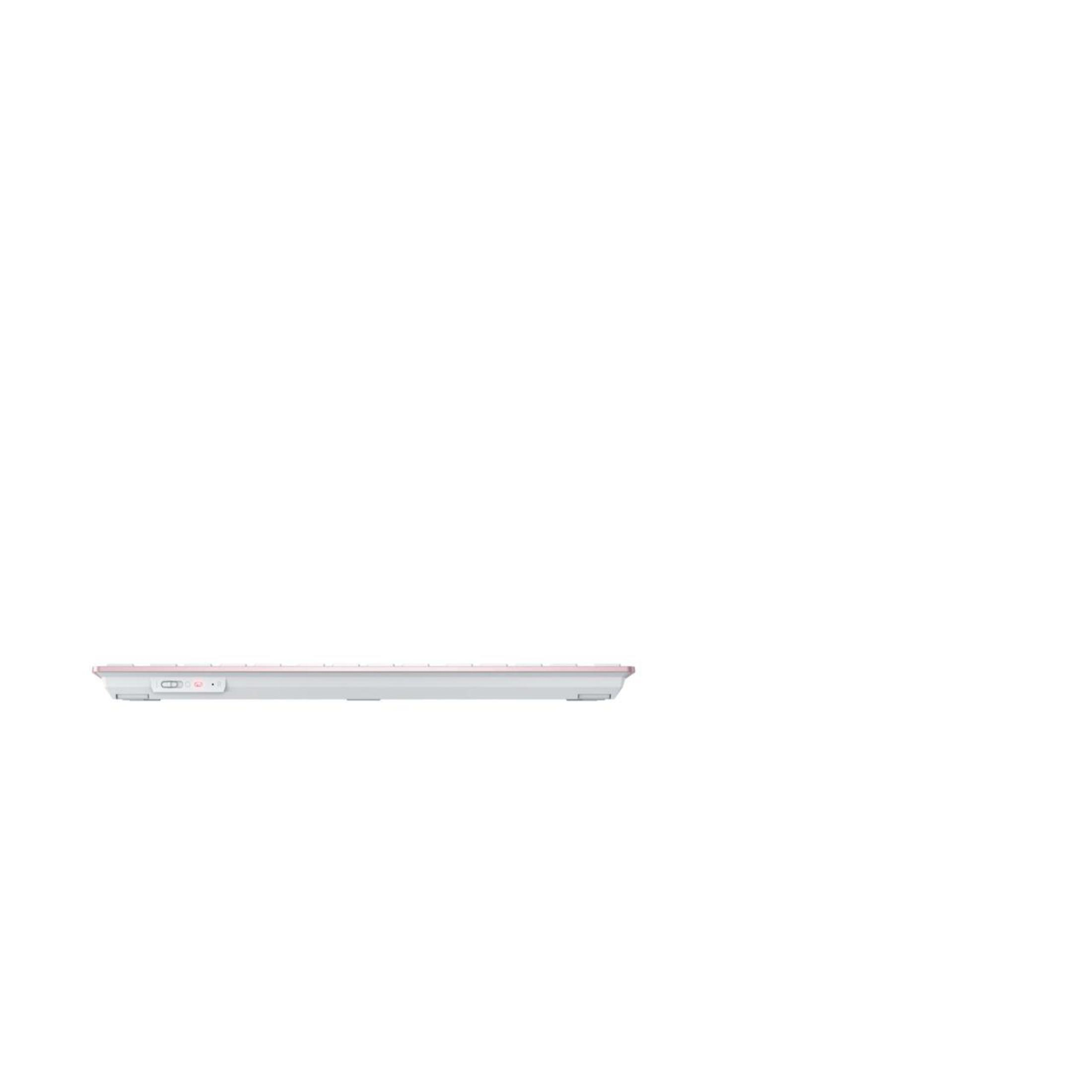 A thin, light-colored keyboard.