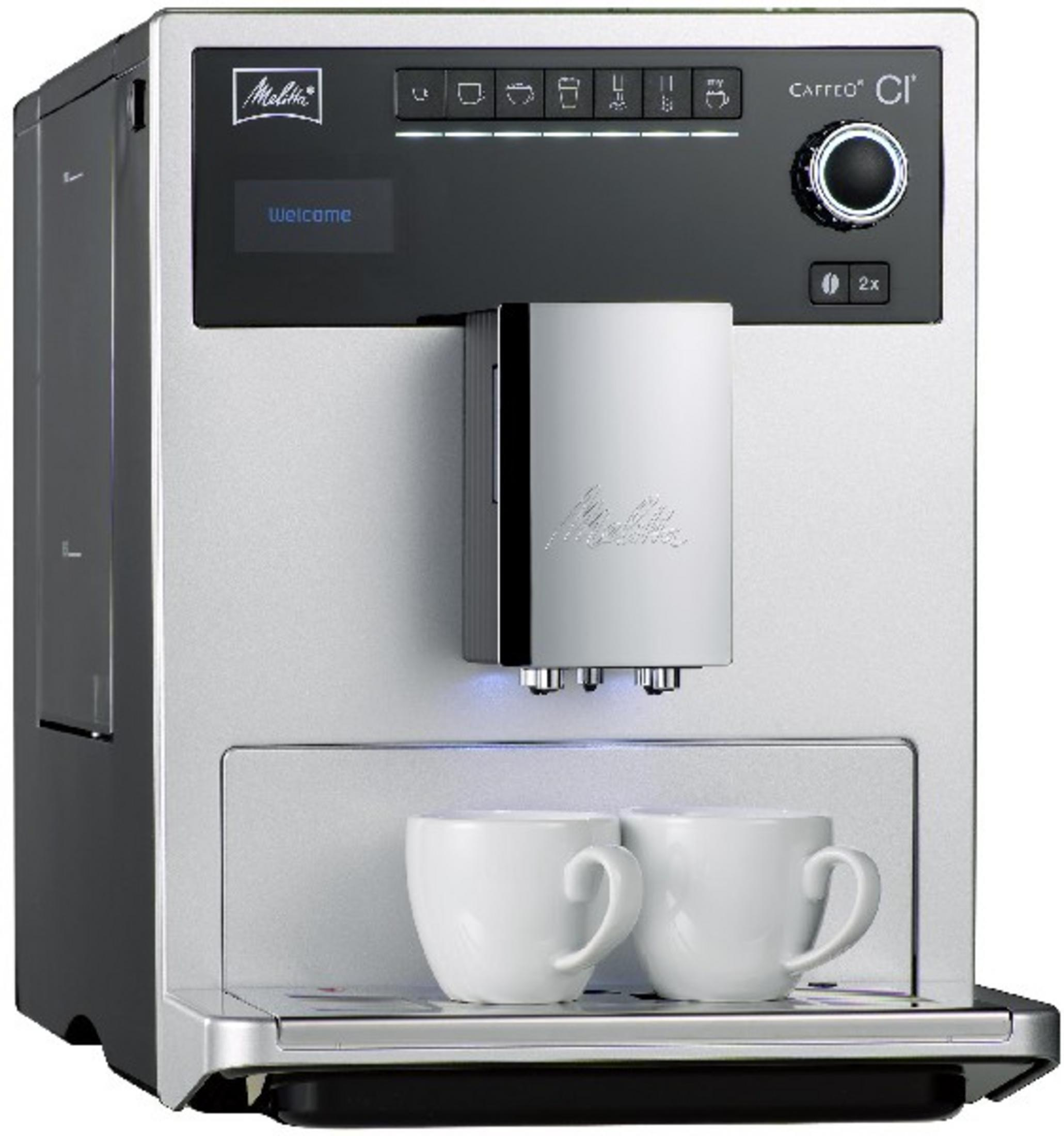 Una cafetera plateada y negra con dos tazas blancas delante.