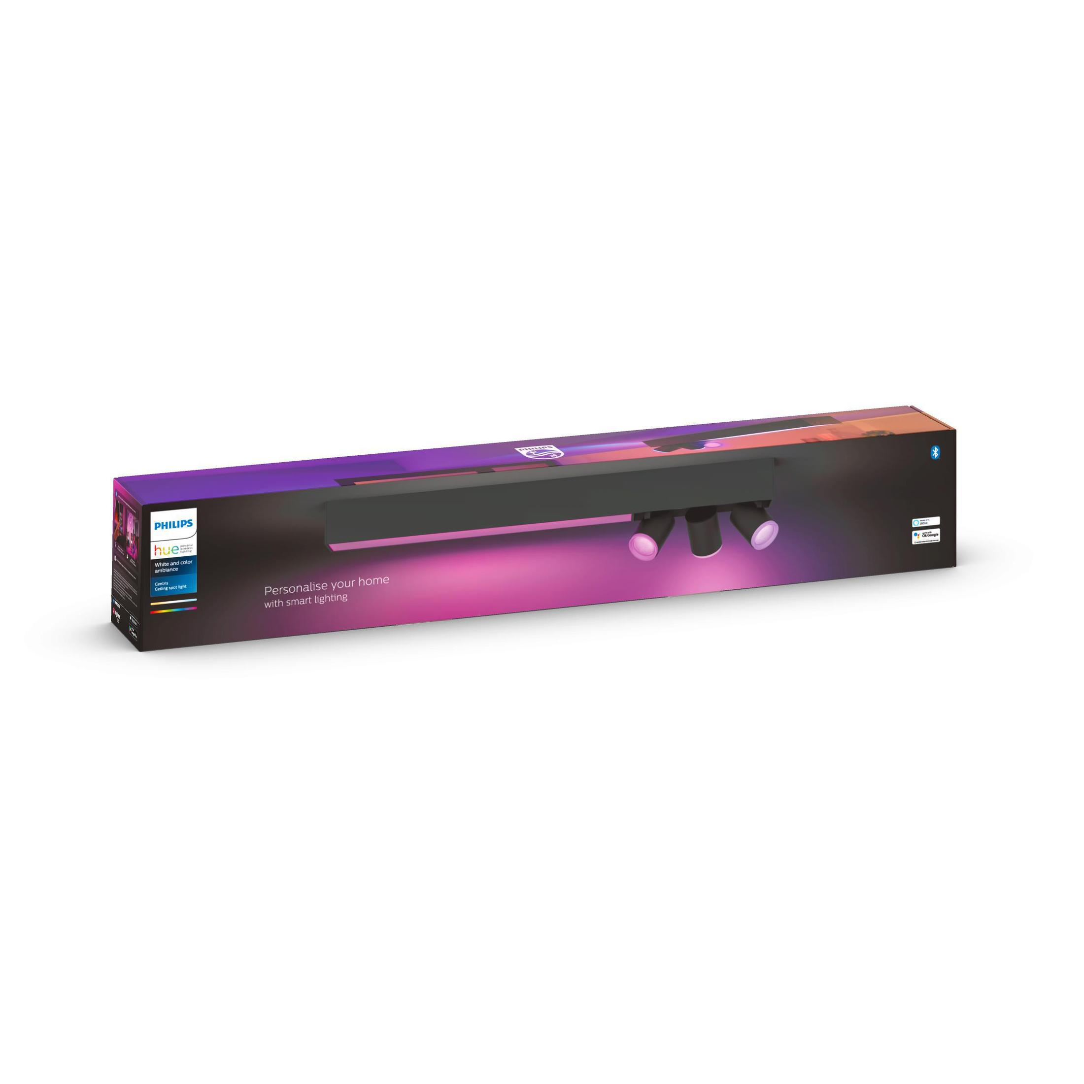 Una scatola luminosa rettangolare Philips Hue con tre faretti. La scatola è nera e viola, con testo.