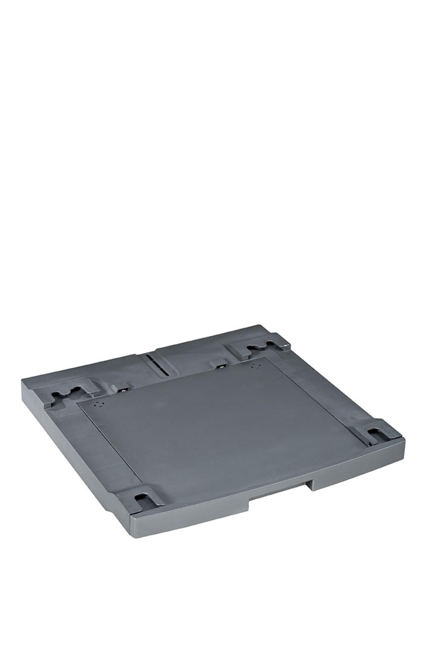 Eine graue, rechteckige Basis auf einer weißen Oberfläche.