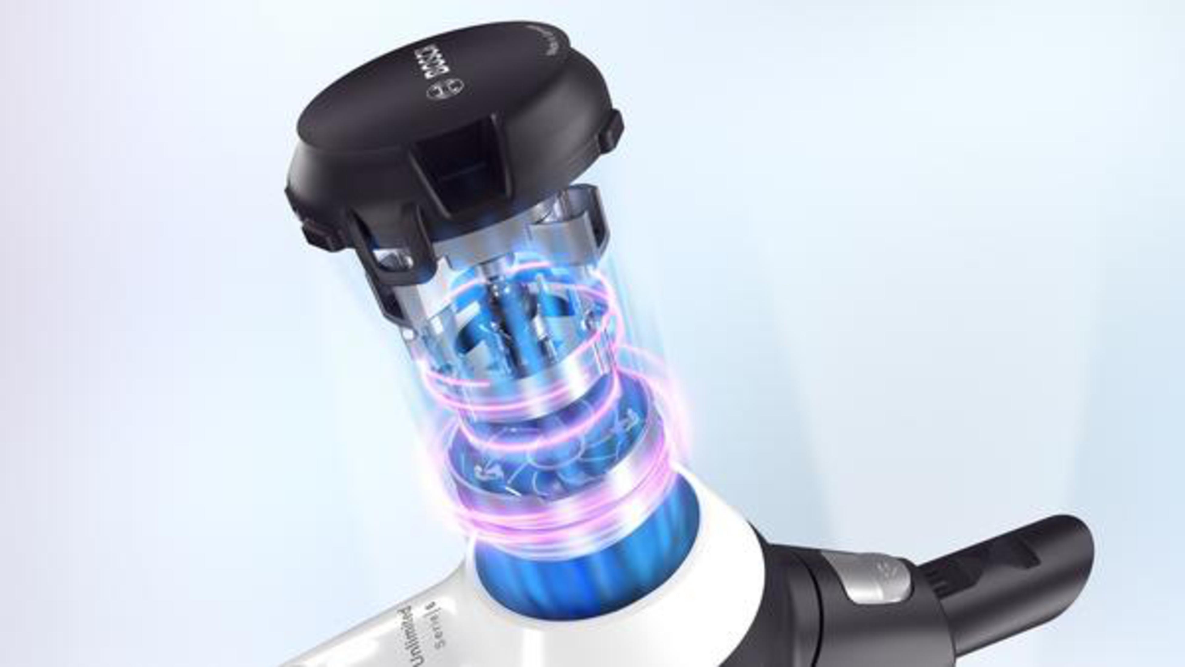 Primer plano del componente del motor de una aspiradora con luces azules y rosas.