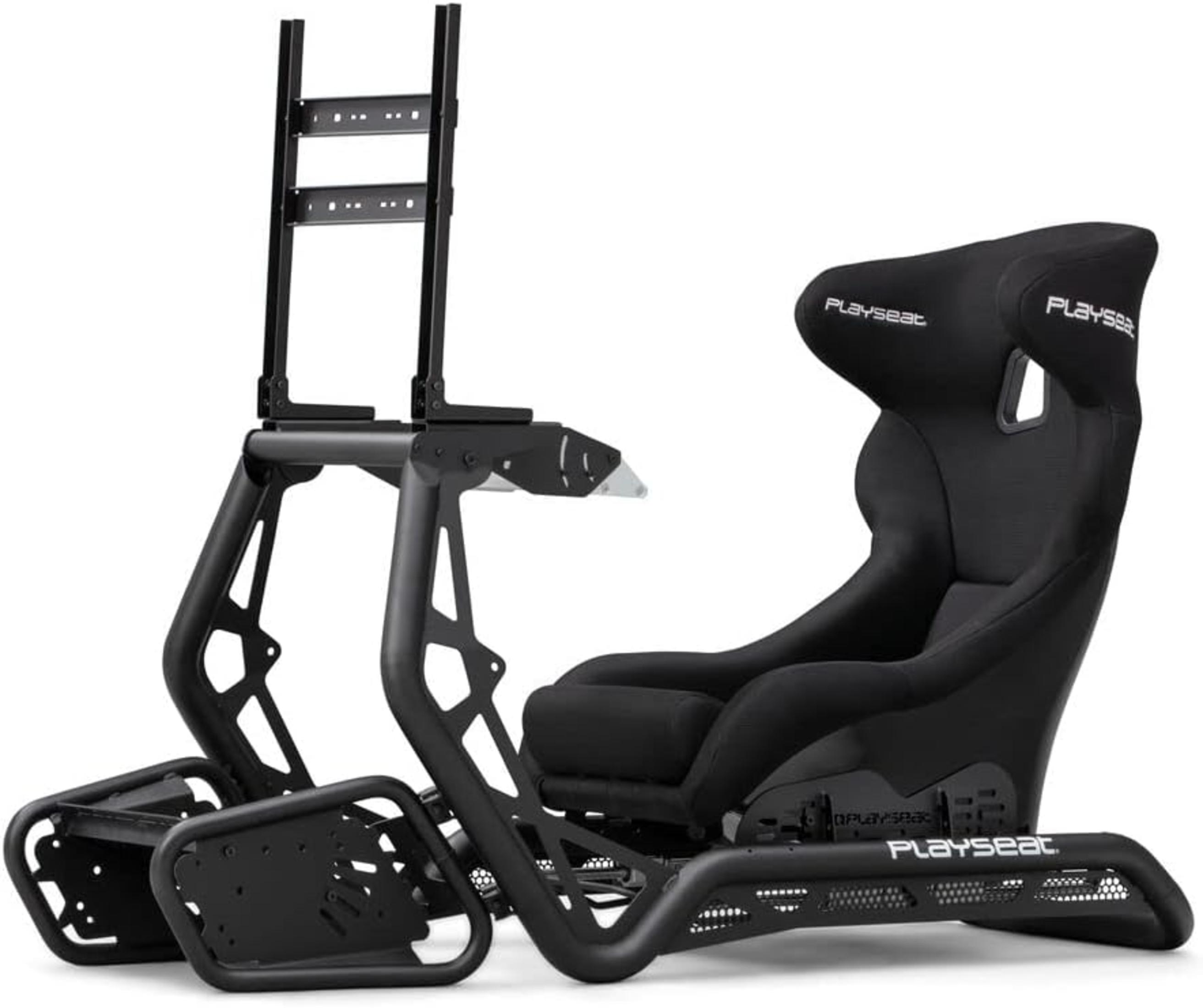 Black racing simulator chair with a frame, screen mount, and footrests, isolated on white.