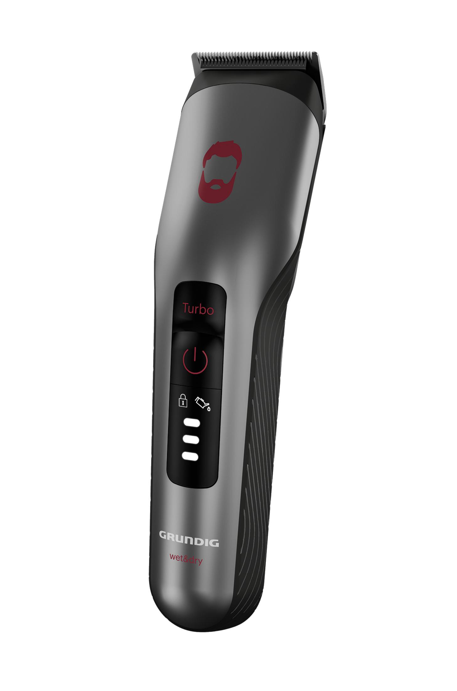 Szara maszynka do brody Grundig, pod kątem w lewo. Posiada czerwony przycisk zasilania i ikonę brody.