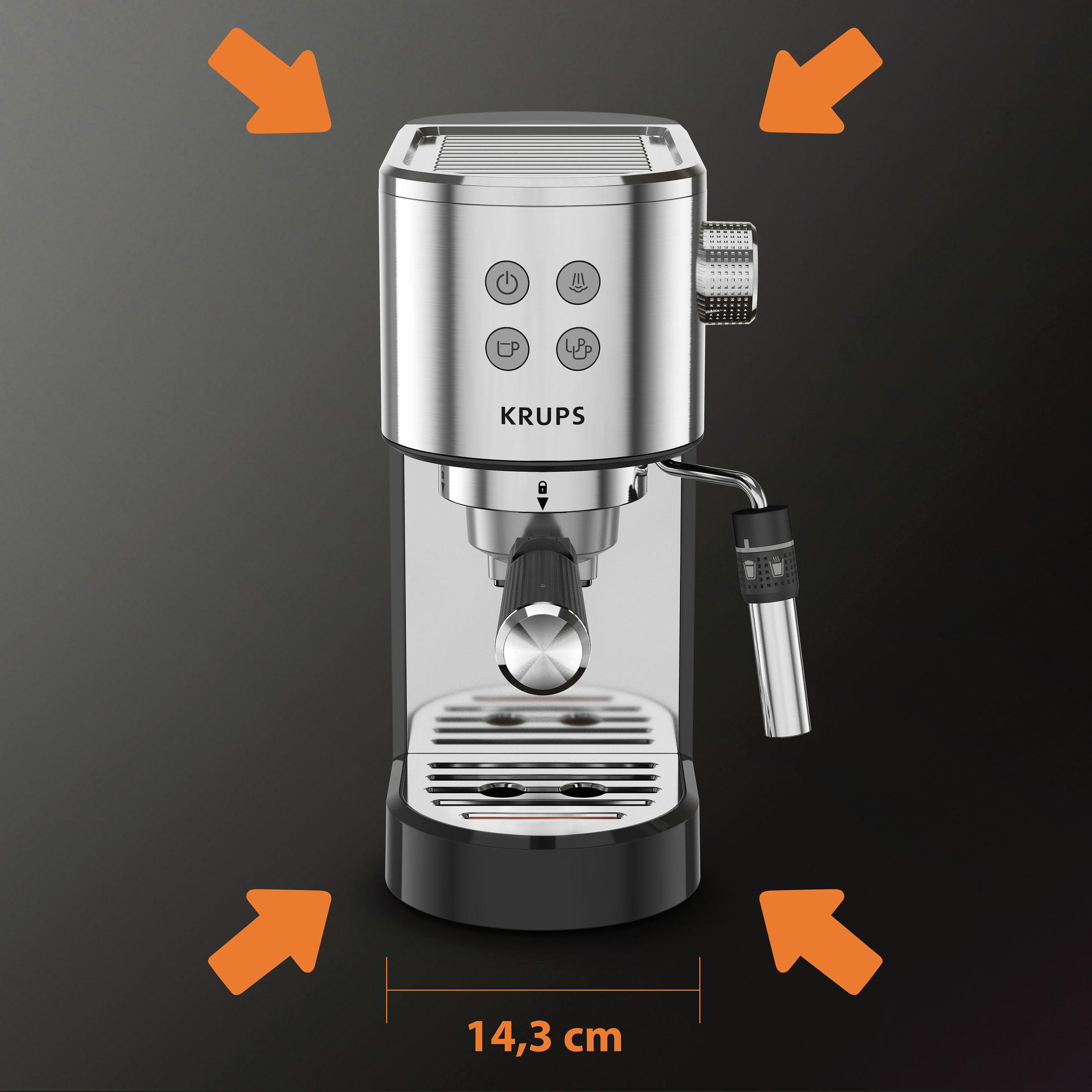 Srebrny ekspres do kawy Krups z przyciskami i wylewką na czarnym tle.