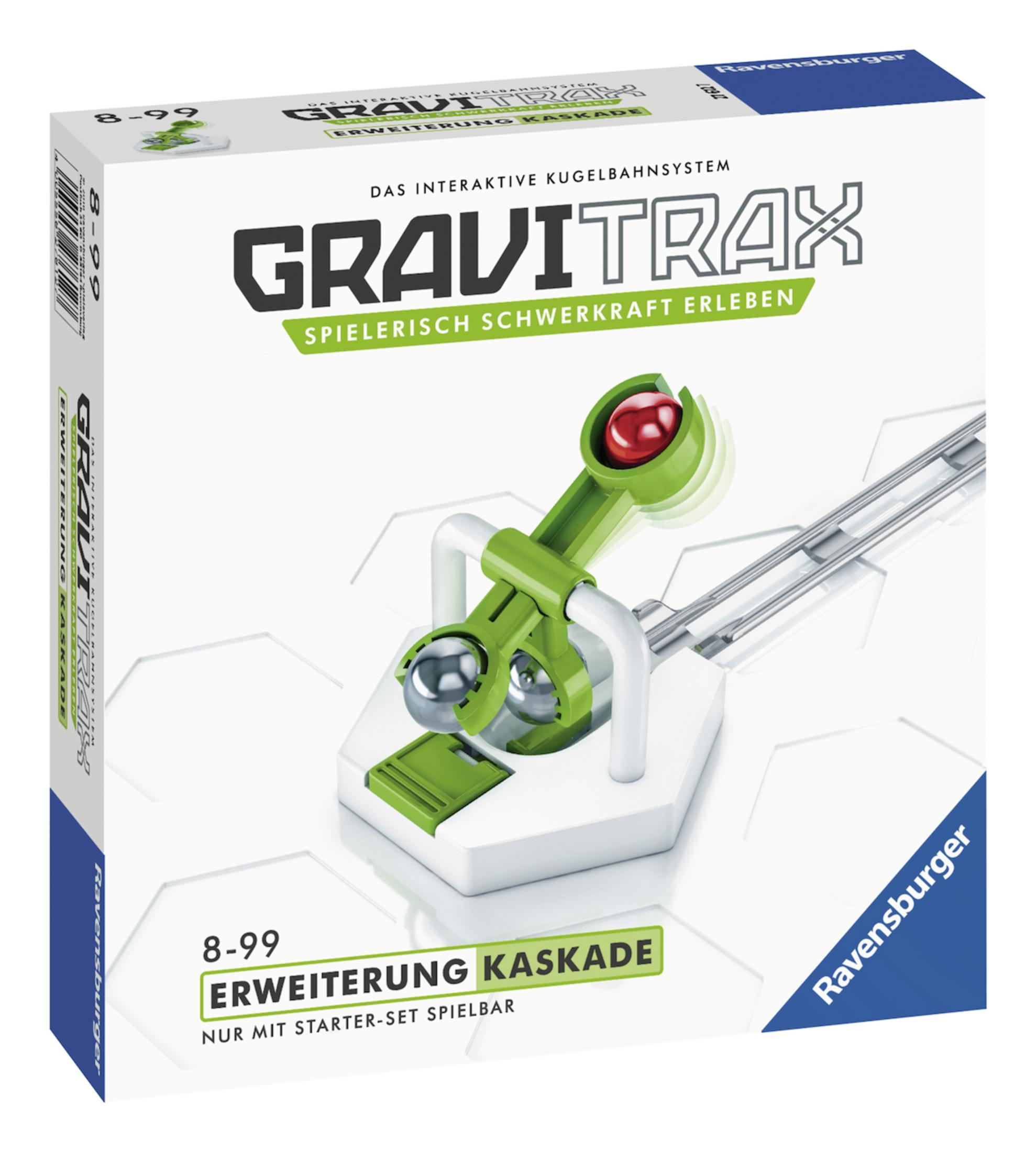 Eine Gravitrax-Box mit einem Erweiterungsset, die eine Murmelbahn mit einem grünen Element und Text zeigt.