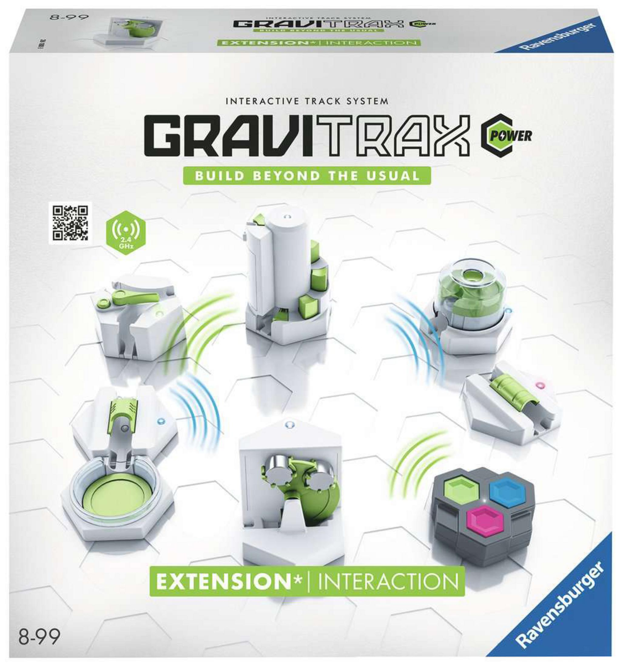 Scatola di Gravitrax, un sistema di binari interattivo con componenti bianchi e verdi.