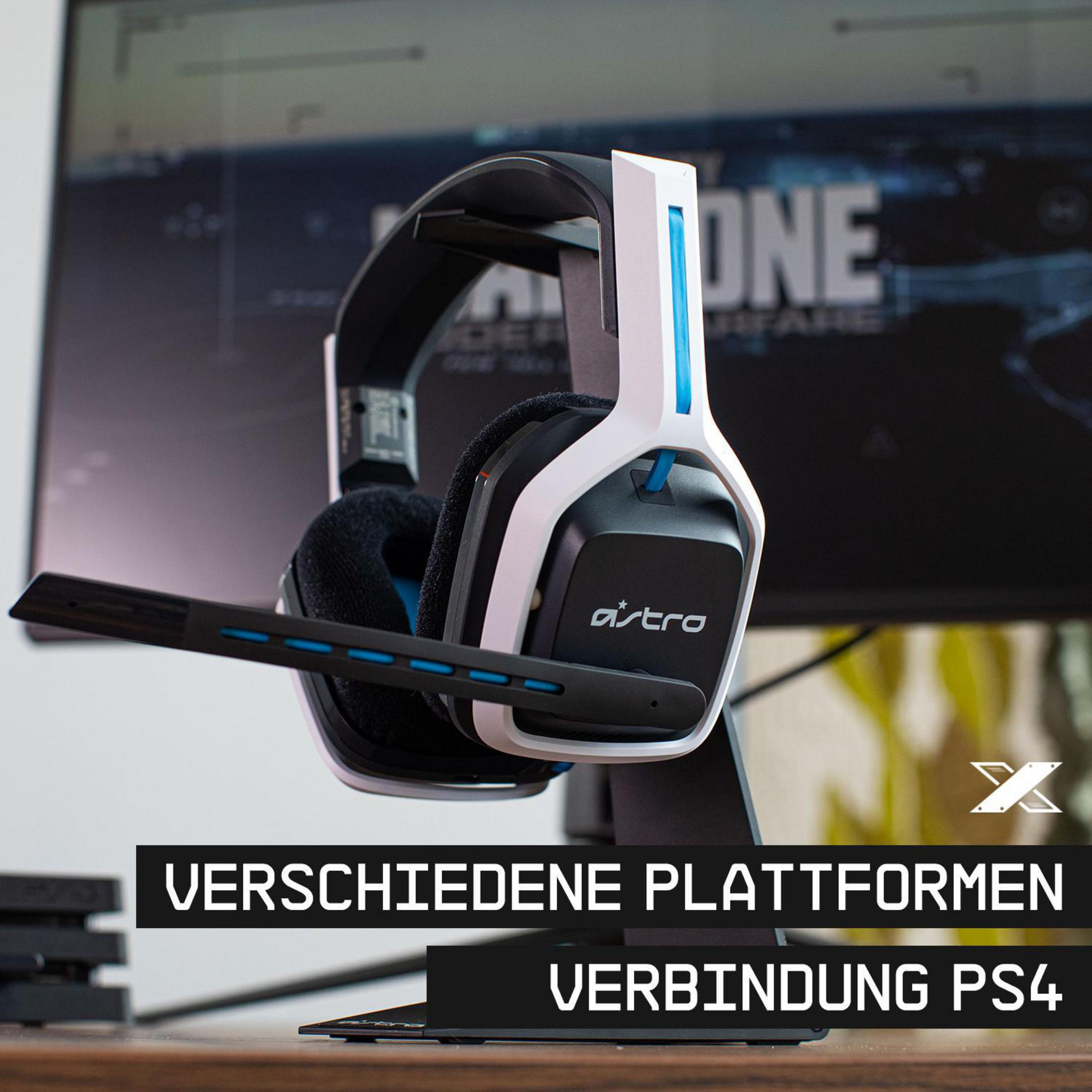 Biało-czarny zestaw słuchawkowy dla graczy z mikrofonem na stojaku przed monitorem. Tekst na monitorze.