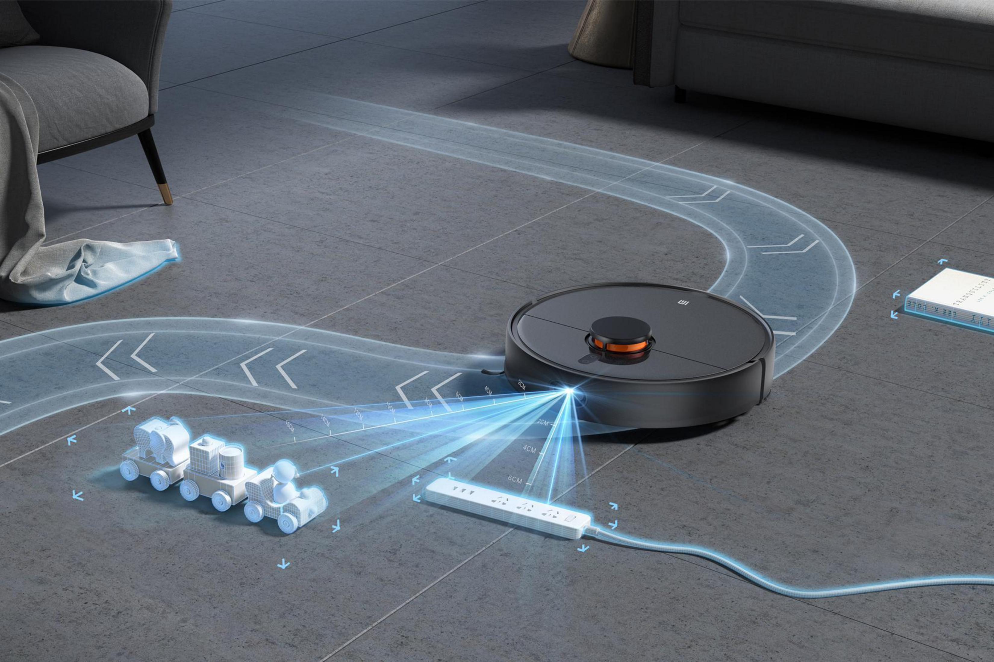 Robot aspirador limpiando el suelo, ruta de limpieza azul claro.