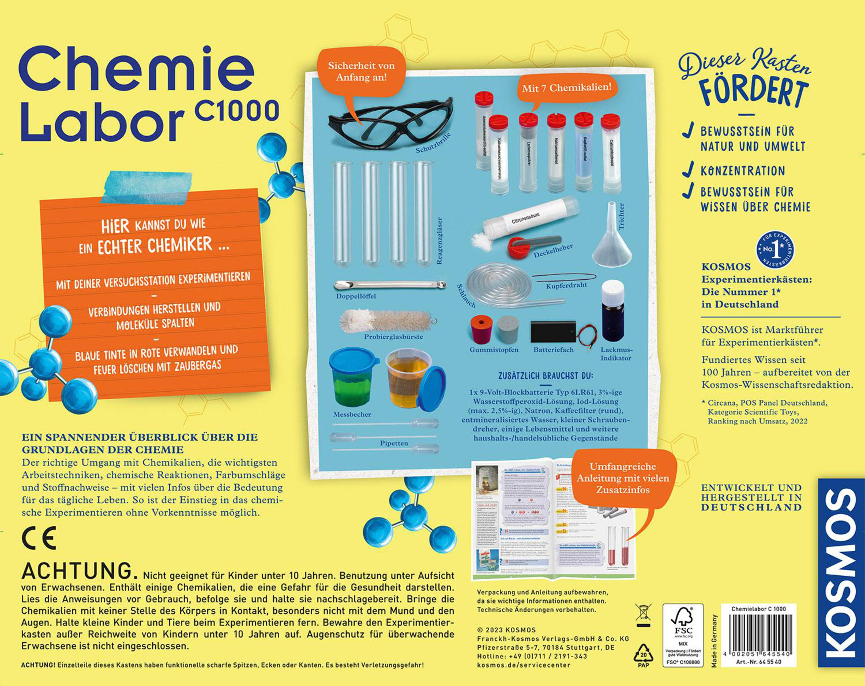 Scatola del kit di laboratorio di chimica, con vari strumenti, prodotti chimici e istruzioni.