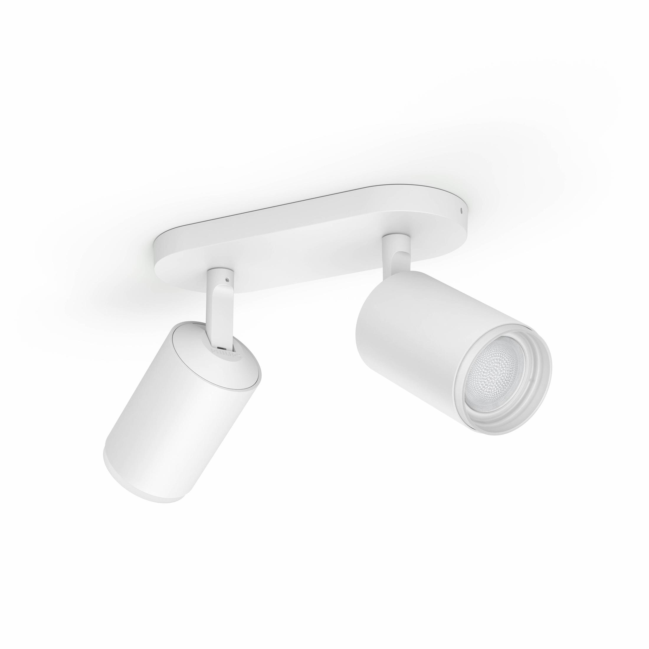 Białe reflektory sufitowe. Dwa cylindryczne światła, regulowany kąt, białe tło, nowoczesny design.