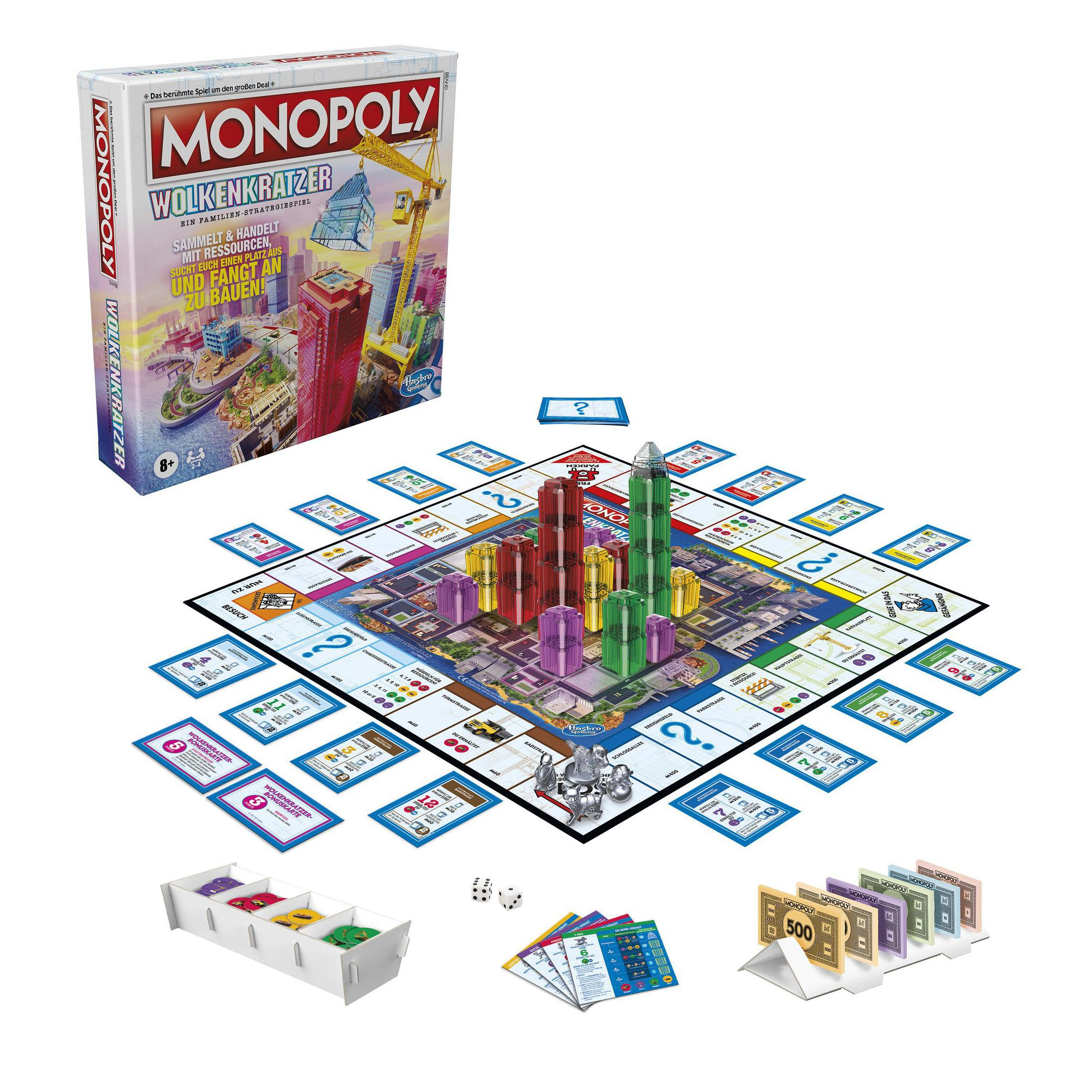 Monopoly-Spiel, Brett, Karten, Würfel und Gebäude. Die Box hat Hochhäuser.