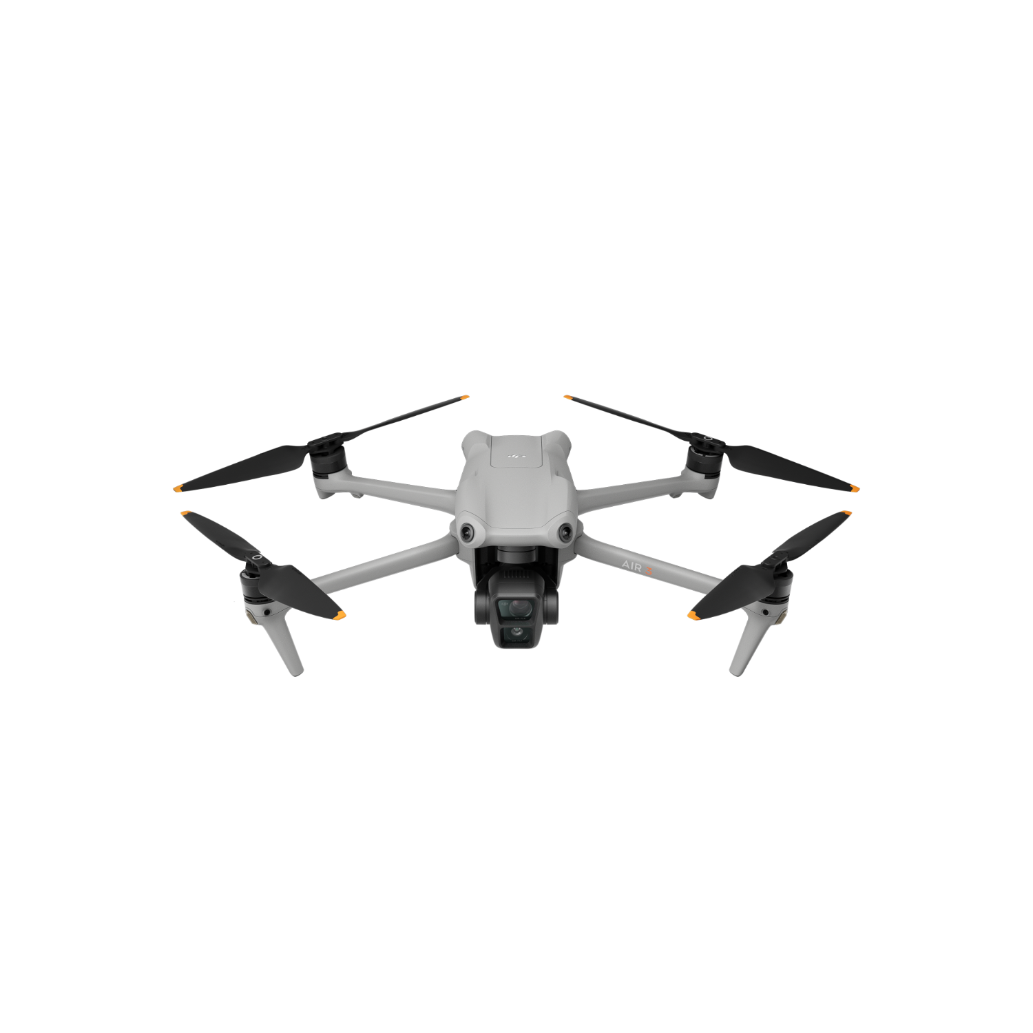 Szary dron z czterema śmigłami. Czarne łopaty śmigieł i pomarańczowe akcenty. Białe tło.