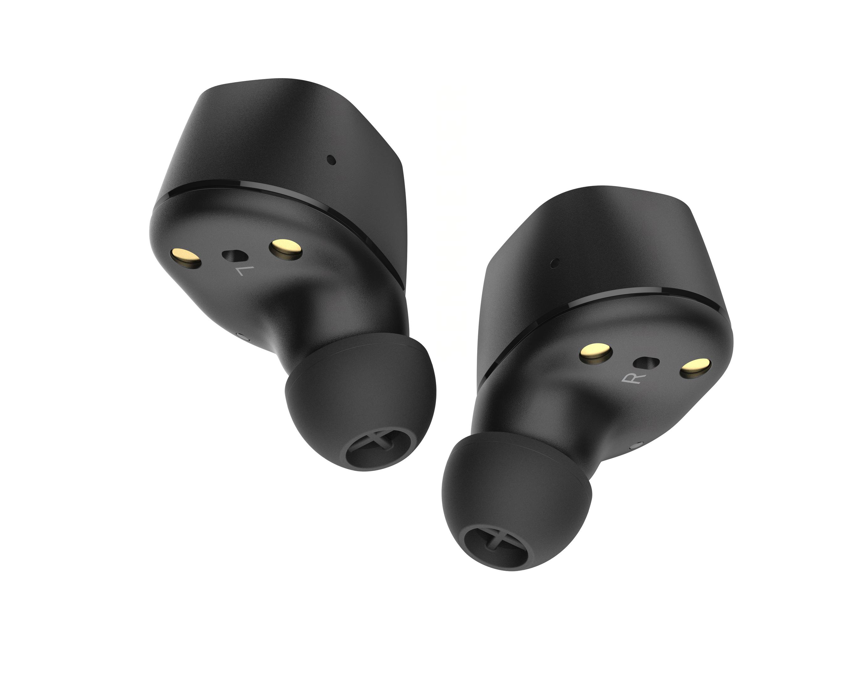 Dos auriculares negros con forma redondeada, cada uno con una pequeña almohadilla y marcados con 'L' y 'R'.