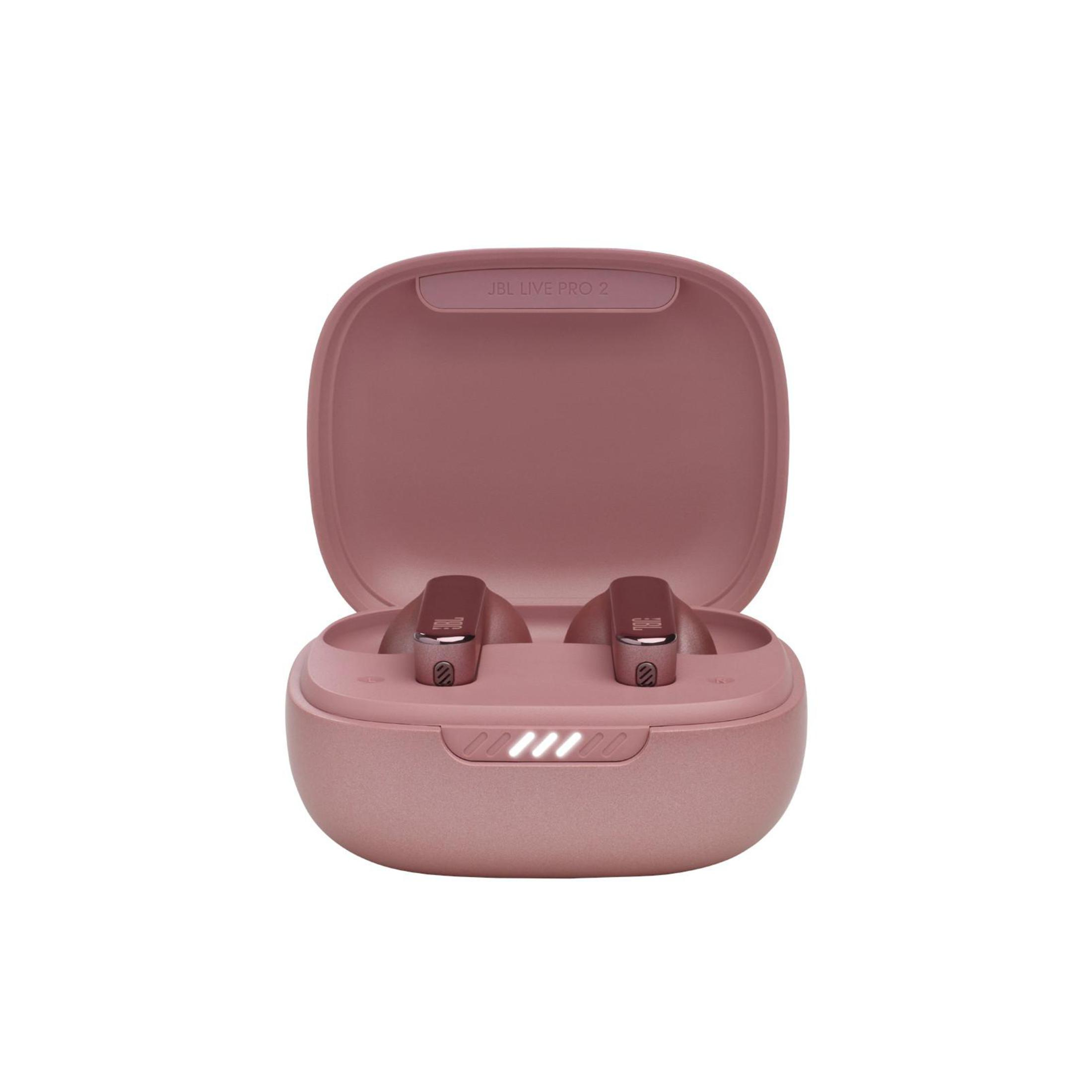 Auriculares inalámbricos rosas en un estuche de carga, abierto. El estuche tiene luces indicadoras blancas.