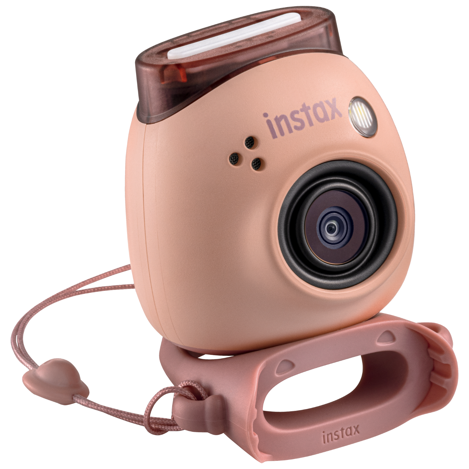 Różowy aparat Instax z obiektywem, lampą błyskową i paskiem na rękę. Marka: "instax".