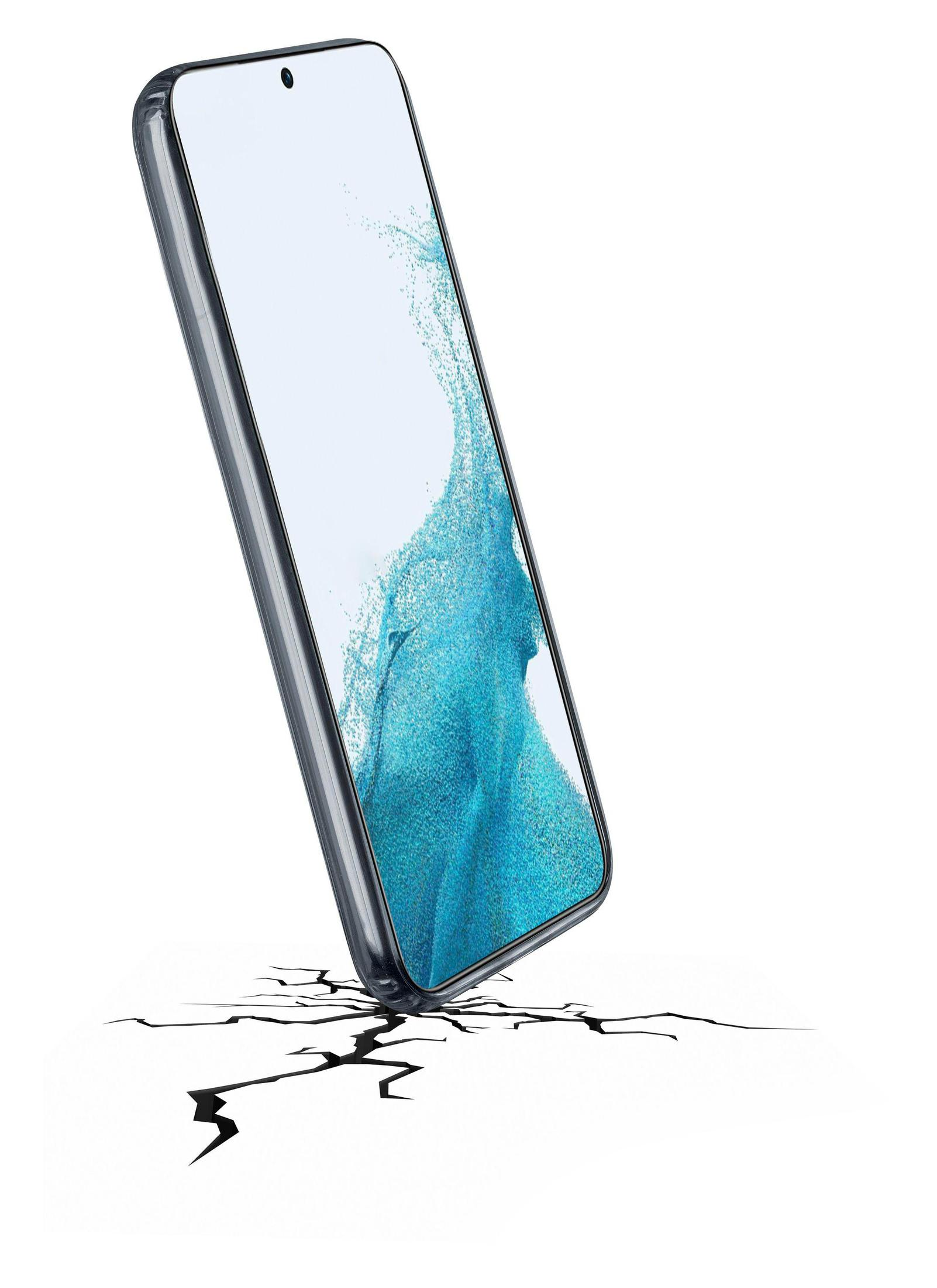Ein Smartphone kippt auf einer gerissenen Oberfläche. Der Bildschirm zeigt ein abstraktes Bild.