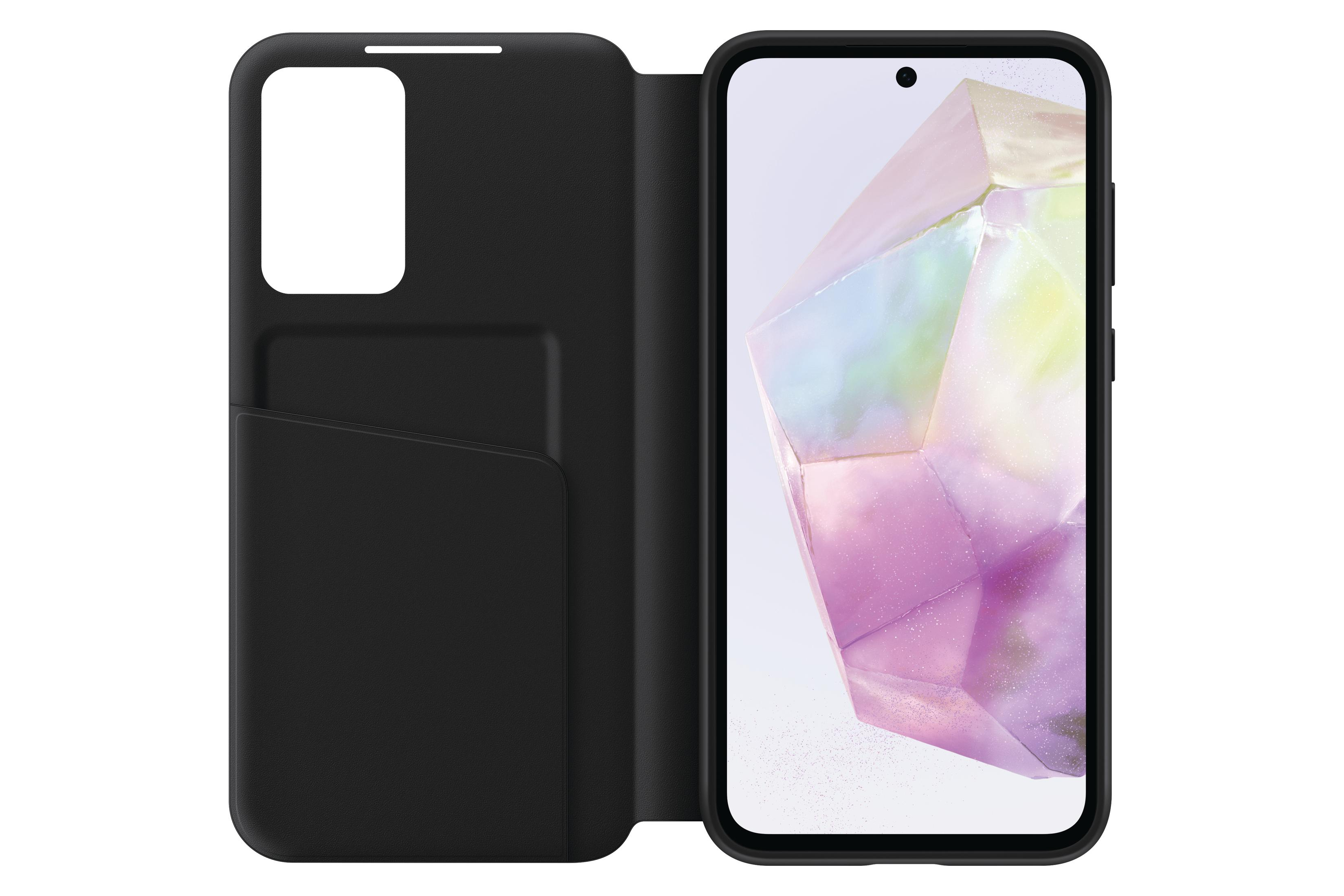 Schwarze Handyhülle mit Portemonnaie, geöffnet, um ein Handy zu zeigen. Das Handy hat einen bunten abstrakten Hintergrund.