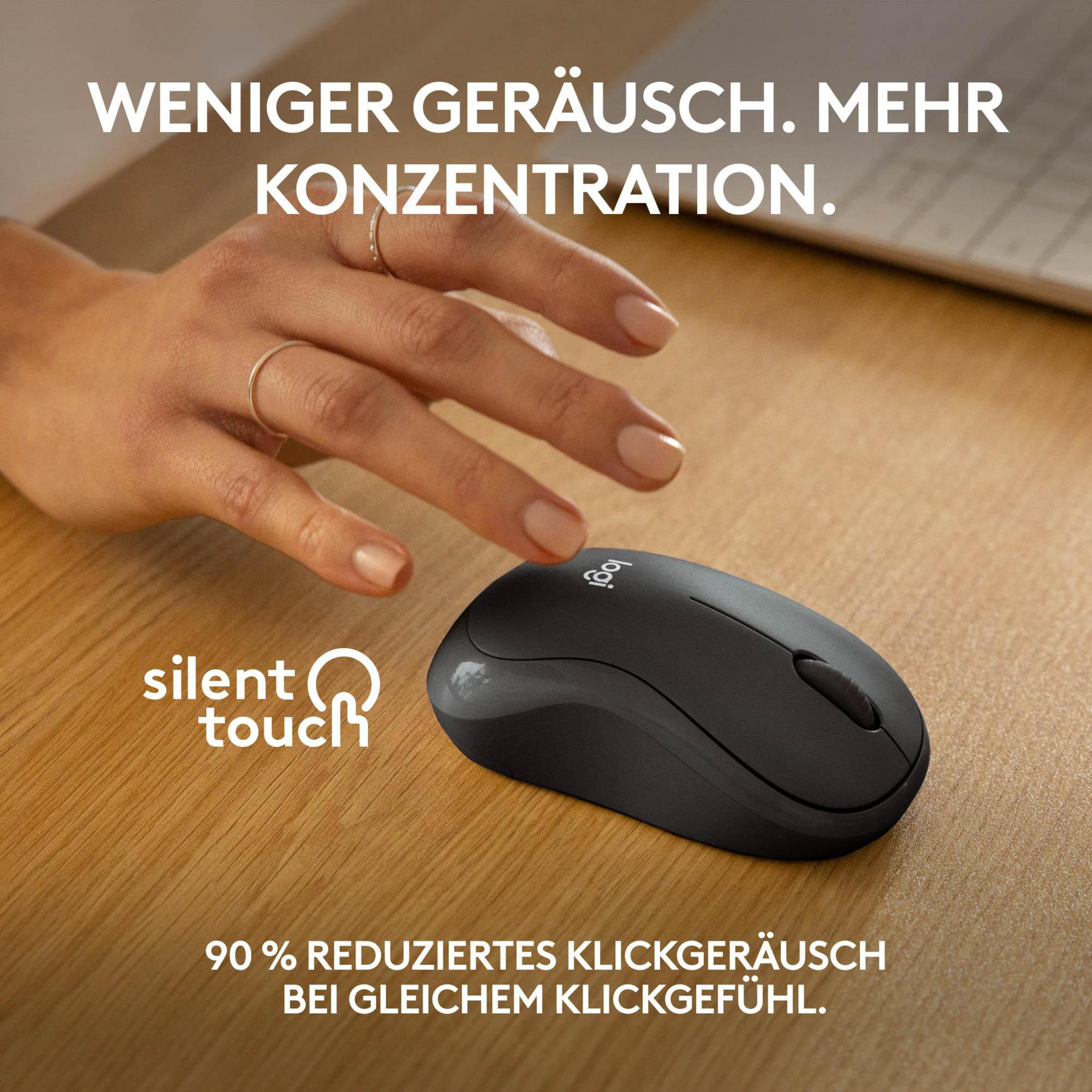 Czarna mysz bezprzewodowa na drewnianym stole. Tekst: Silent Touch.