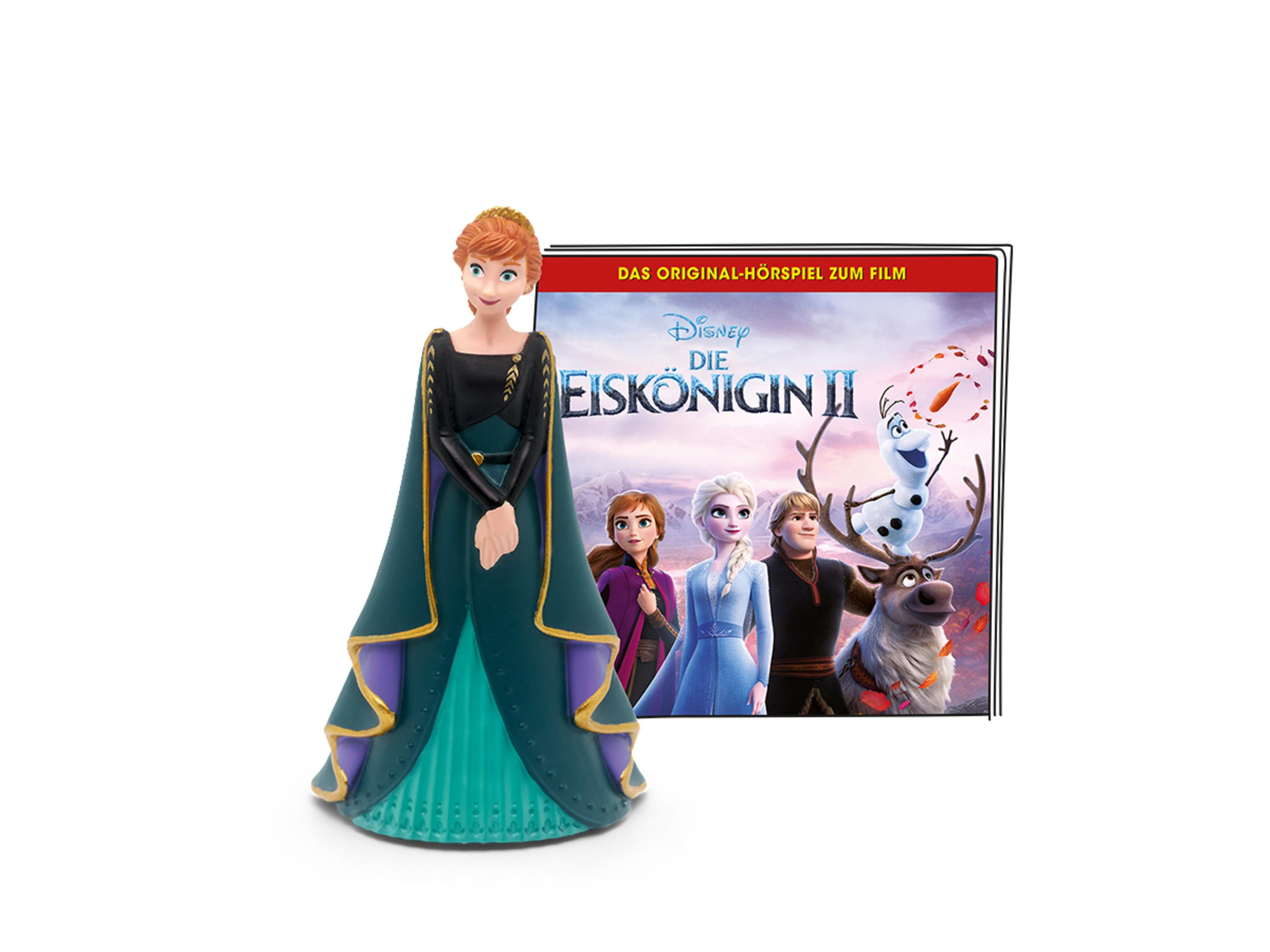 Figur von Anna aus Frozen II. Das Filmposter befindet sich im Hintergrund.