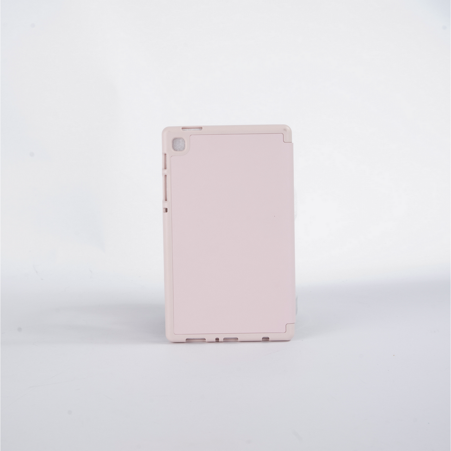 Rückseite eines rosa Tablets. Einfache, hellrosa Farbe.