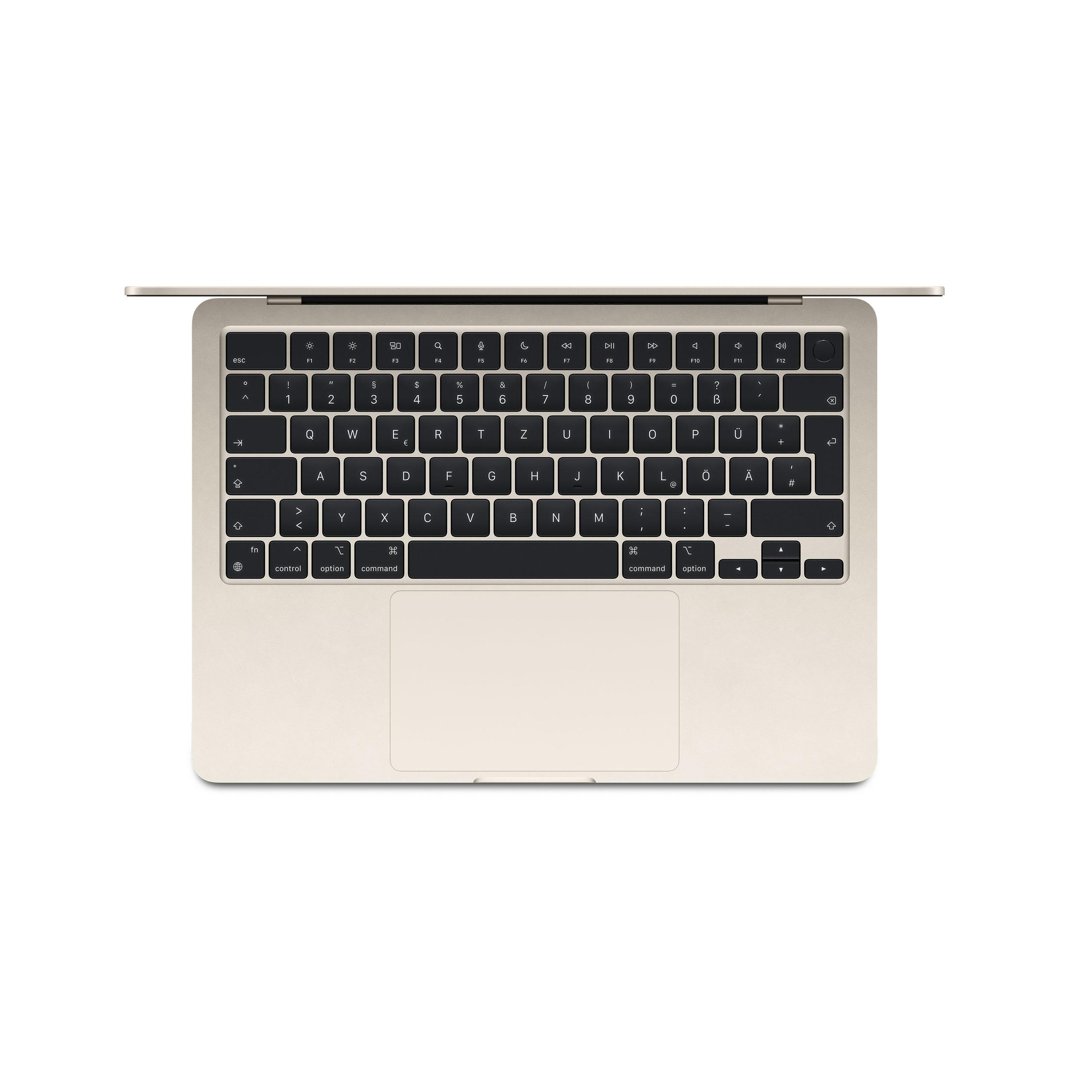 Draufsicht auf Laptop. Goldfarben, geöffnet, Tastatur sichtbar. Der Bildschirm ist nicht sichtbar.