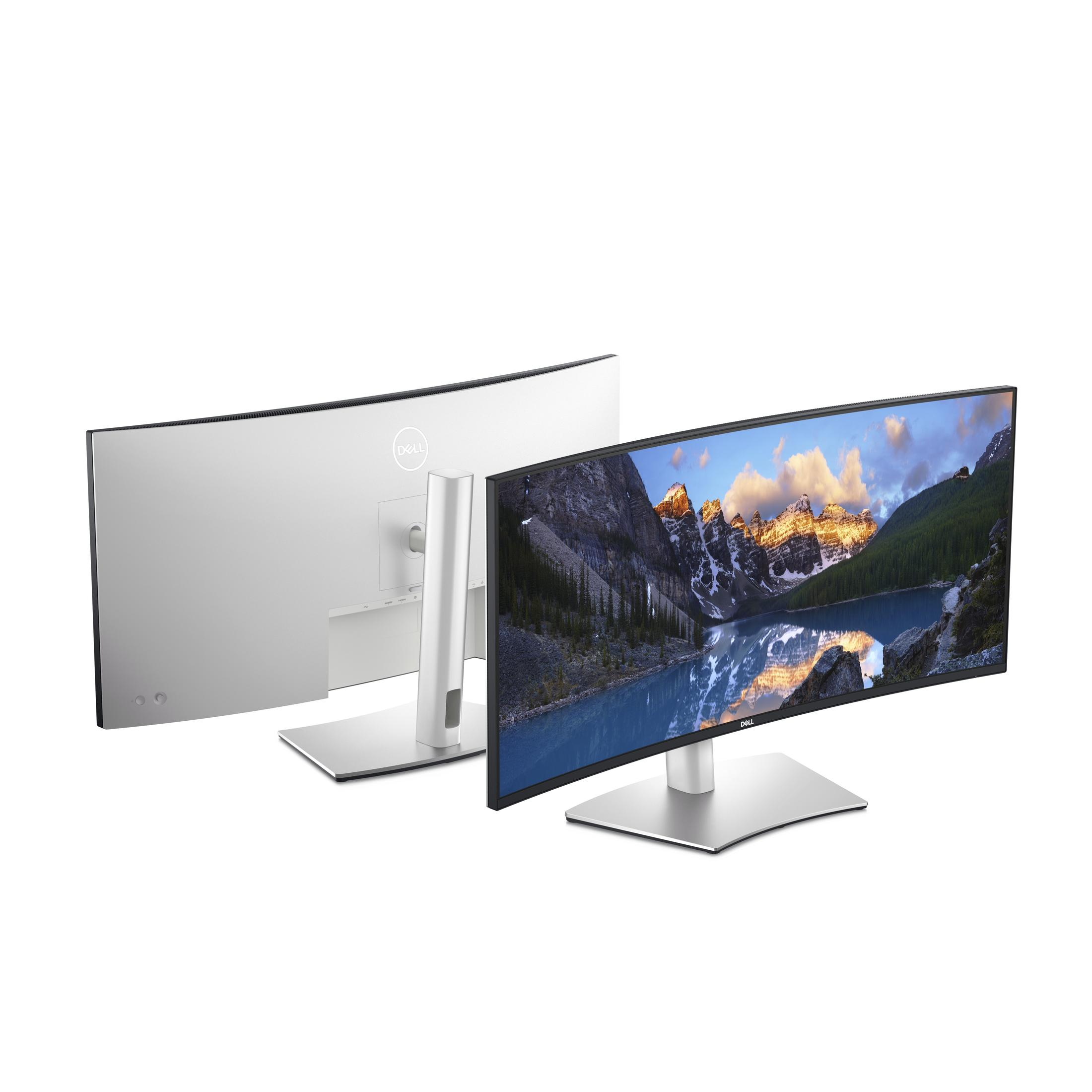 Twee gebogen Dell monitoren met berglandschap op een scherm, witte achtergrond.