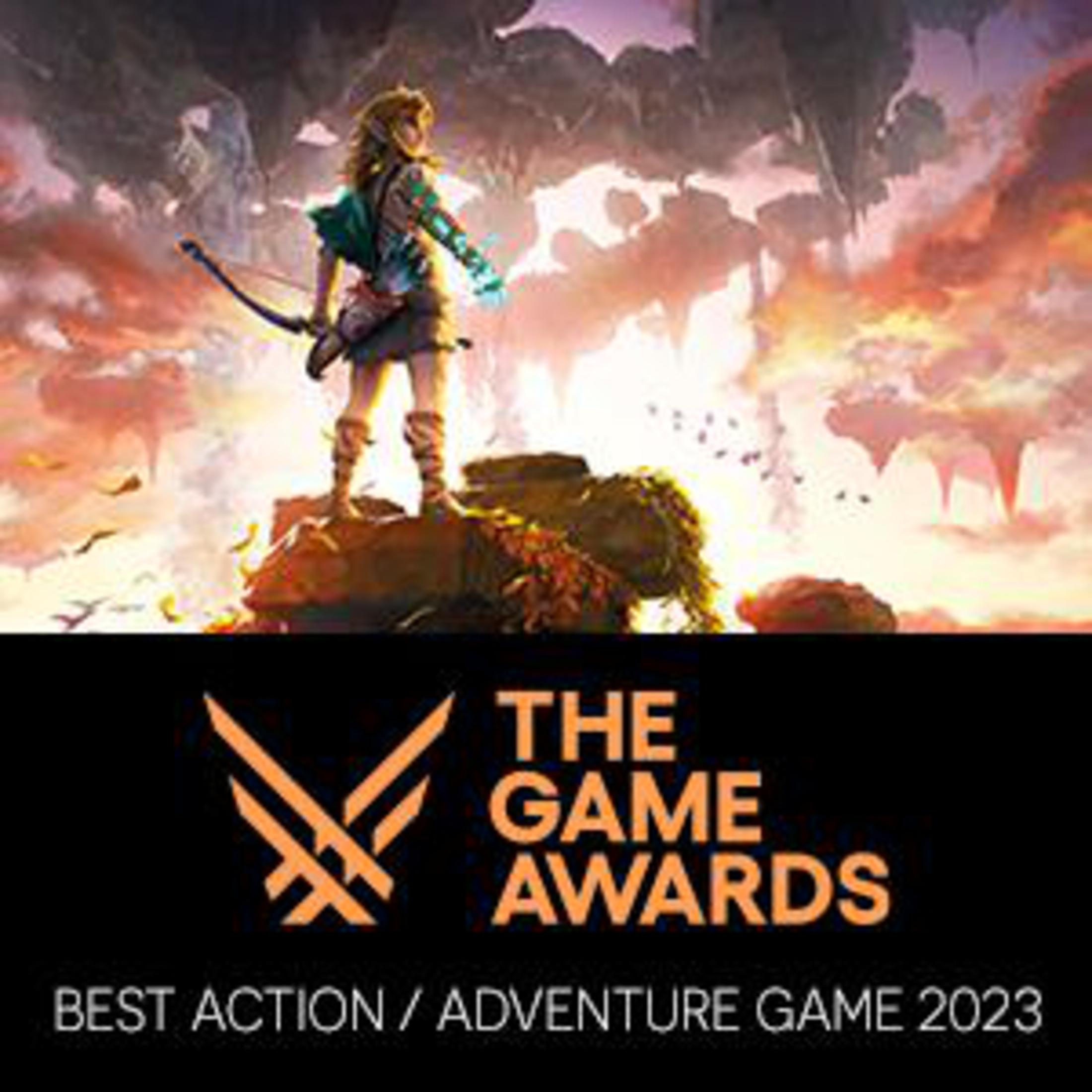 Il logo dei The Game Awards 2023 con l'immagine di un personaggio femminile su una roccia.