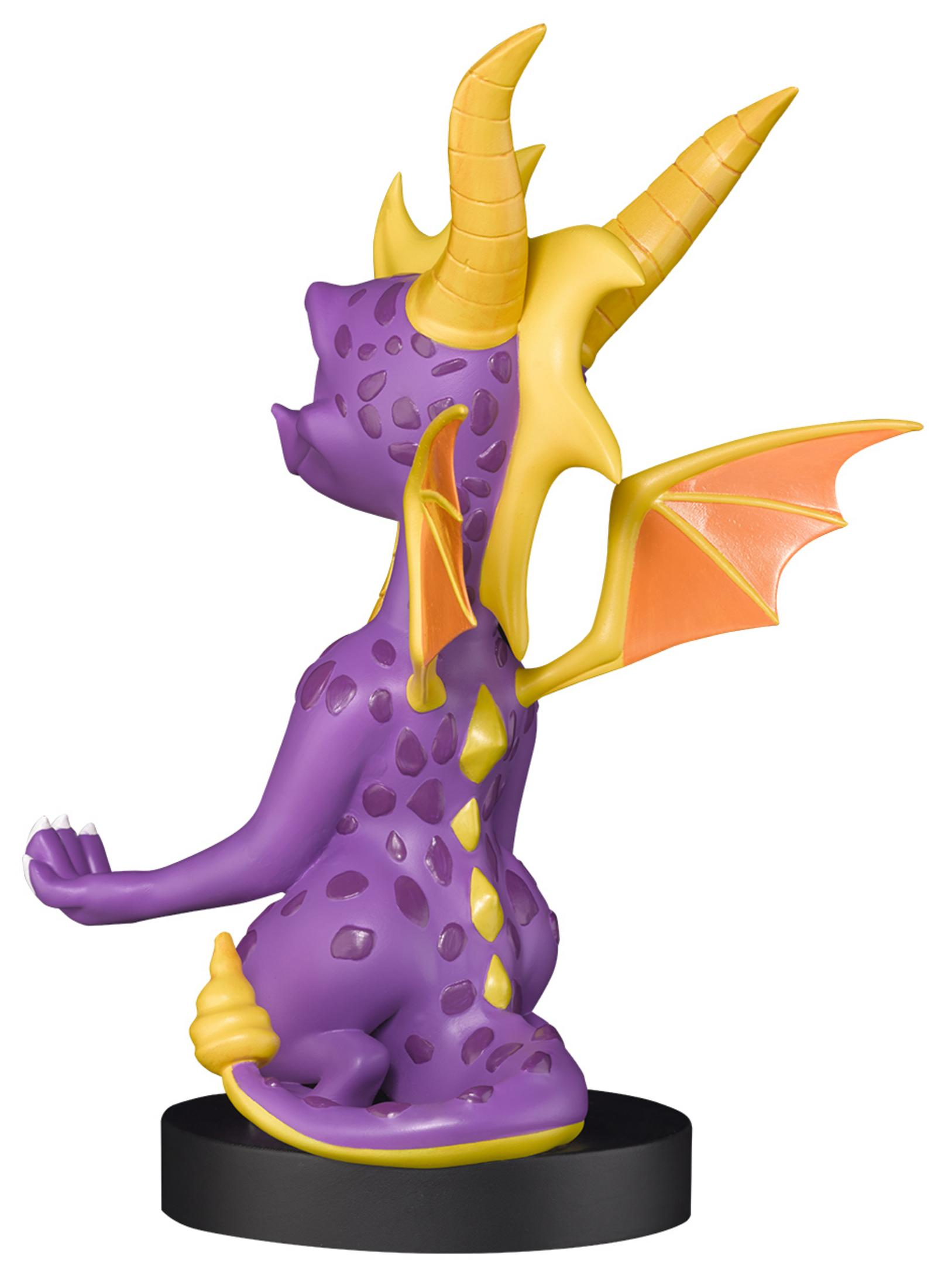 Statuina di Spyro the Dragon. Colori viola e giallo. Base nera. Sfondo bianco.