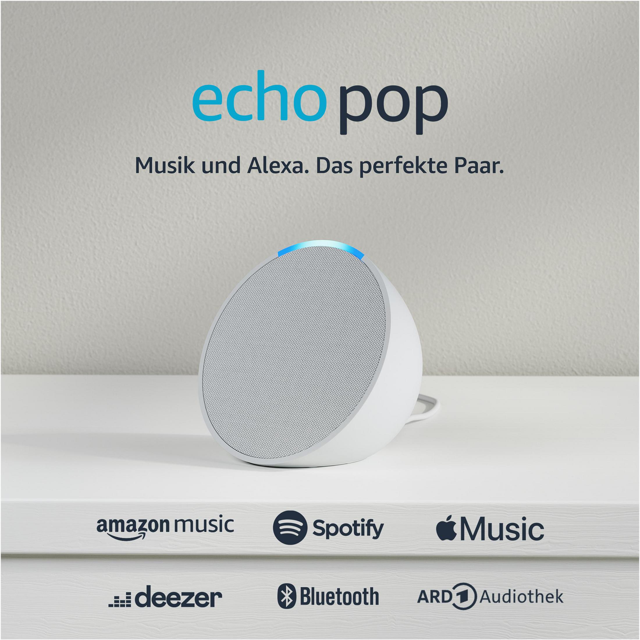 Un altavoz Echo Pop blanco, con las palabras "echo pop" arriba, con logotipos de Amazon Music, Spotify, Music.