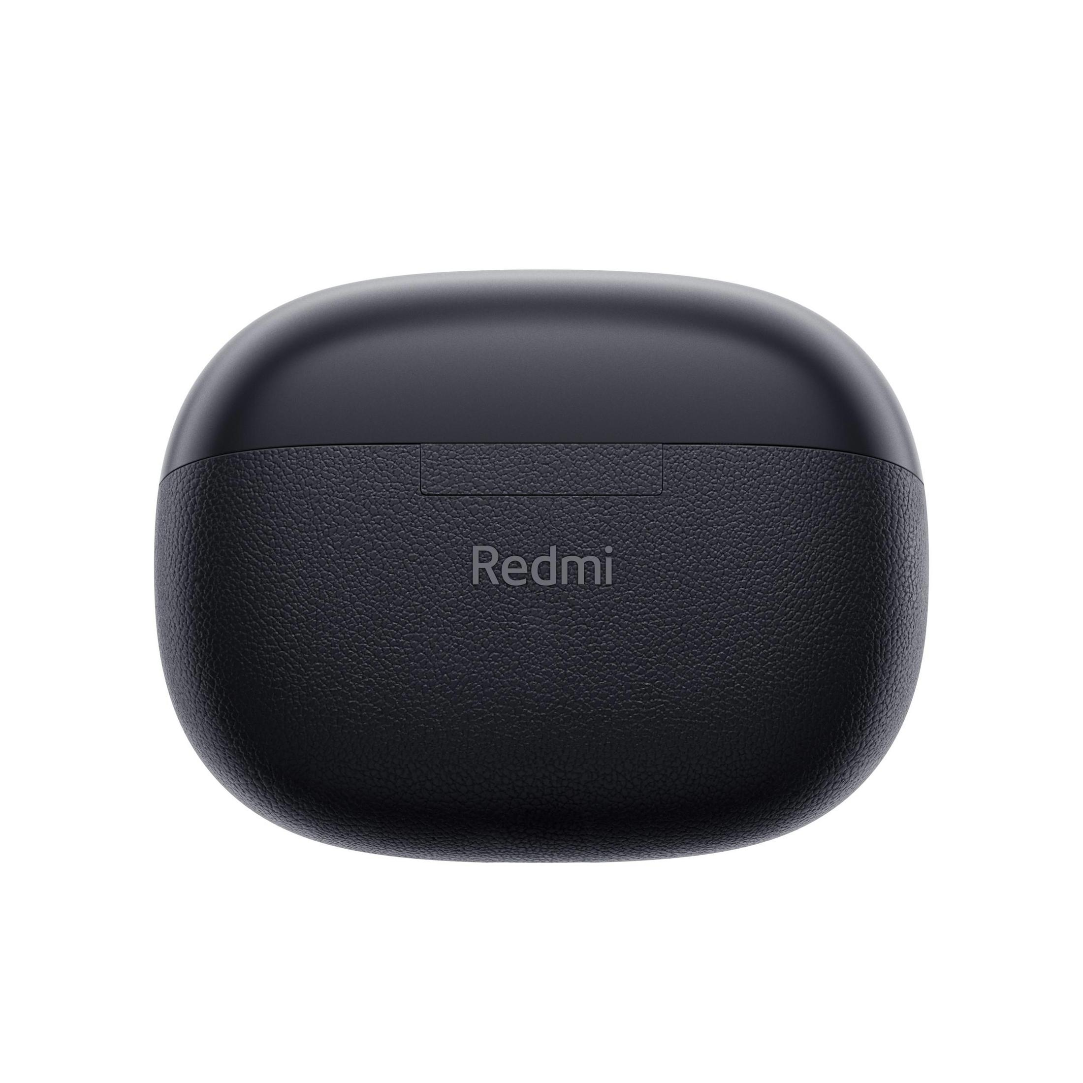 Czarny, owalny futerał ładujący słuchawek Redmi. Logo Redmi jest nadrukowane na pokrywie.