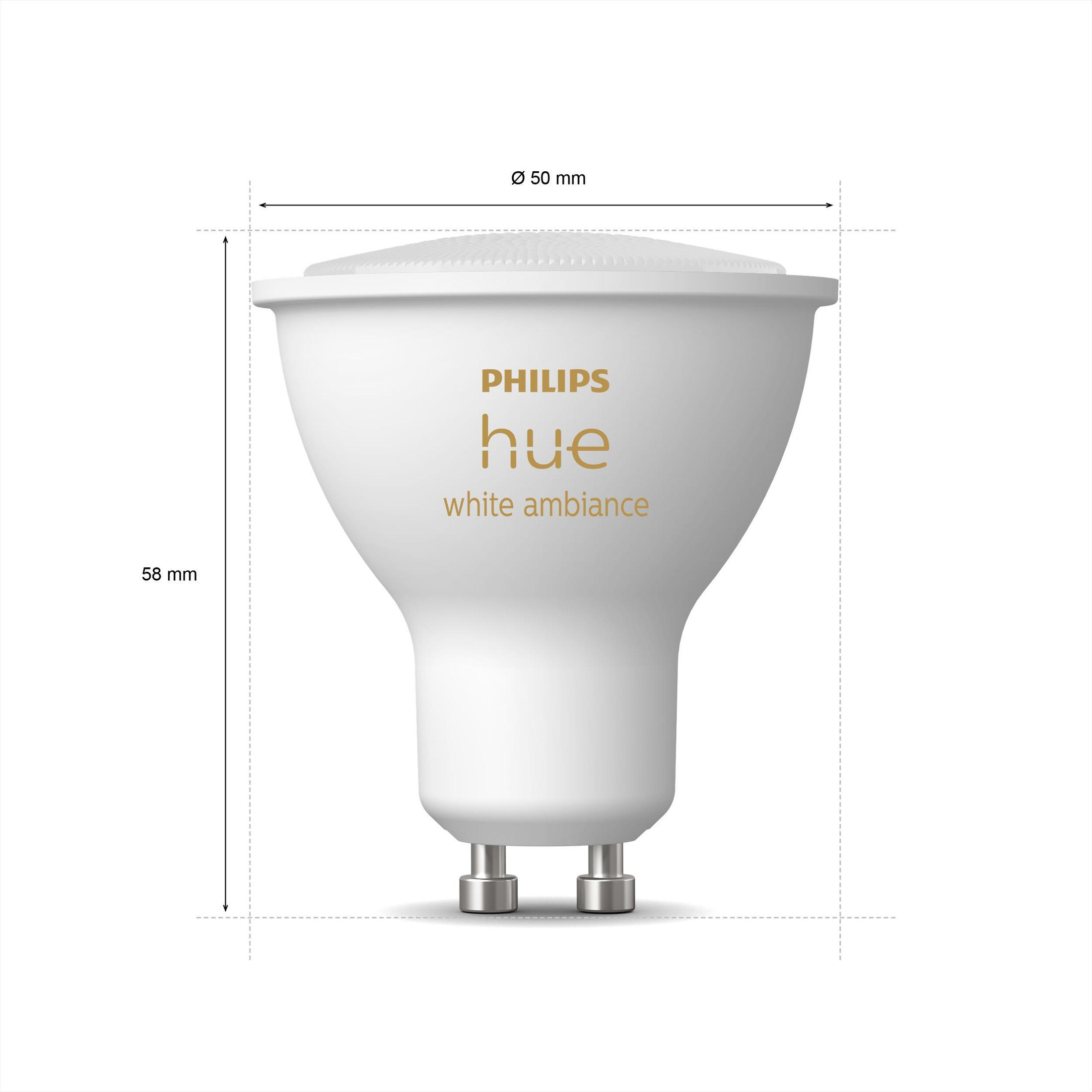 Weiße Philips Hue Glühbirne. Sie ist zylindrisch, mit angezeigten Abmessungen.