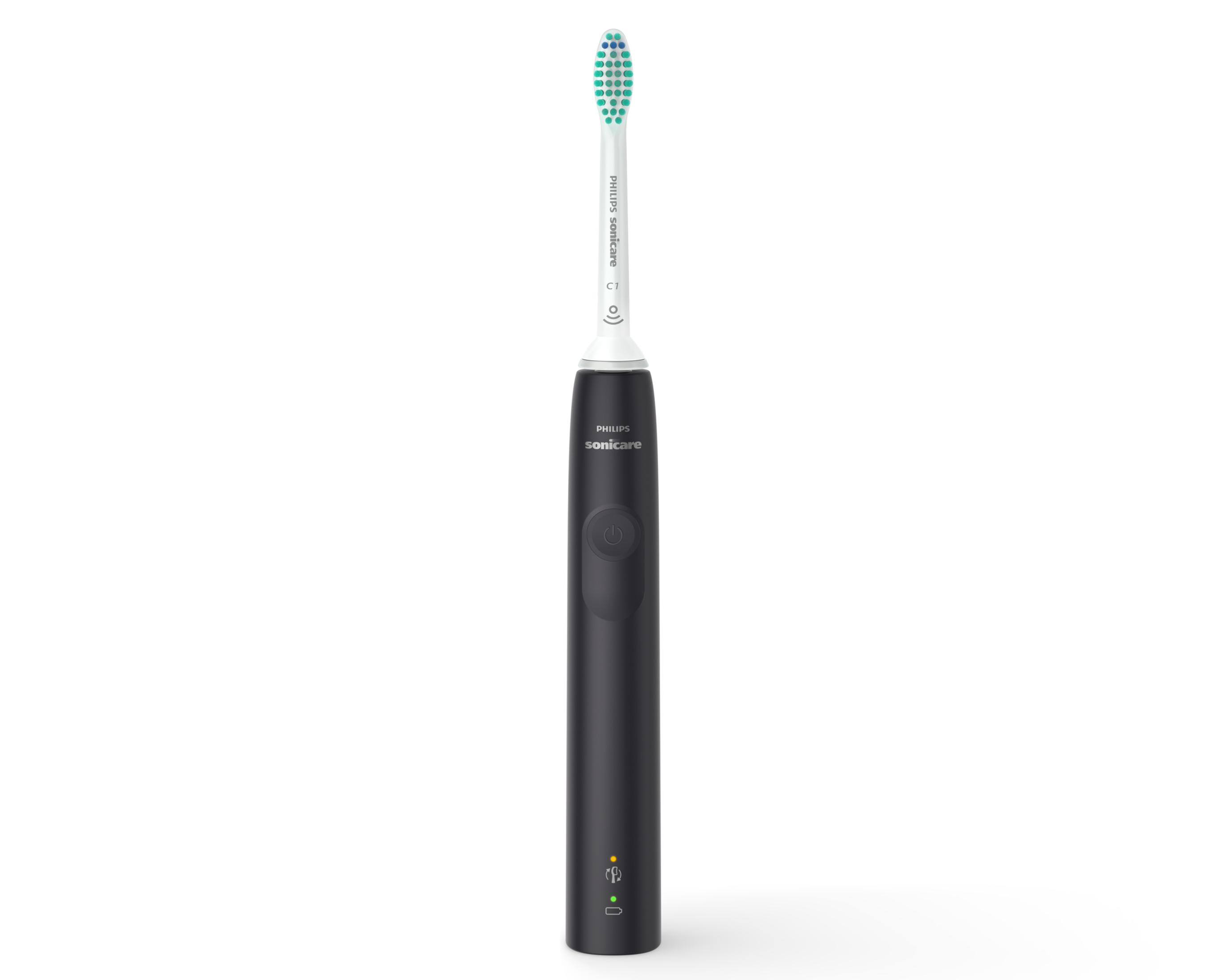 Czarna elektryczna szczoteczka do zębów Philips Sonicare z zieloną główką. Białe tło.