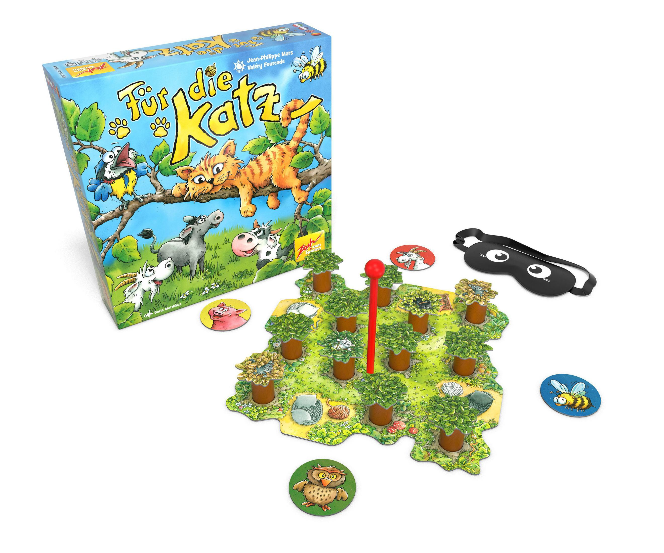 Ein Brettspiel mit einer Katze auf einem Baum, mit Spielsteinen und einer Schachtel mit Illustrationen.