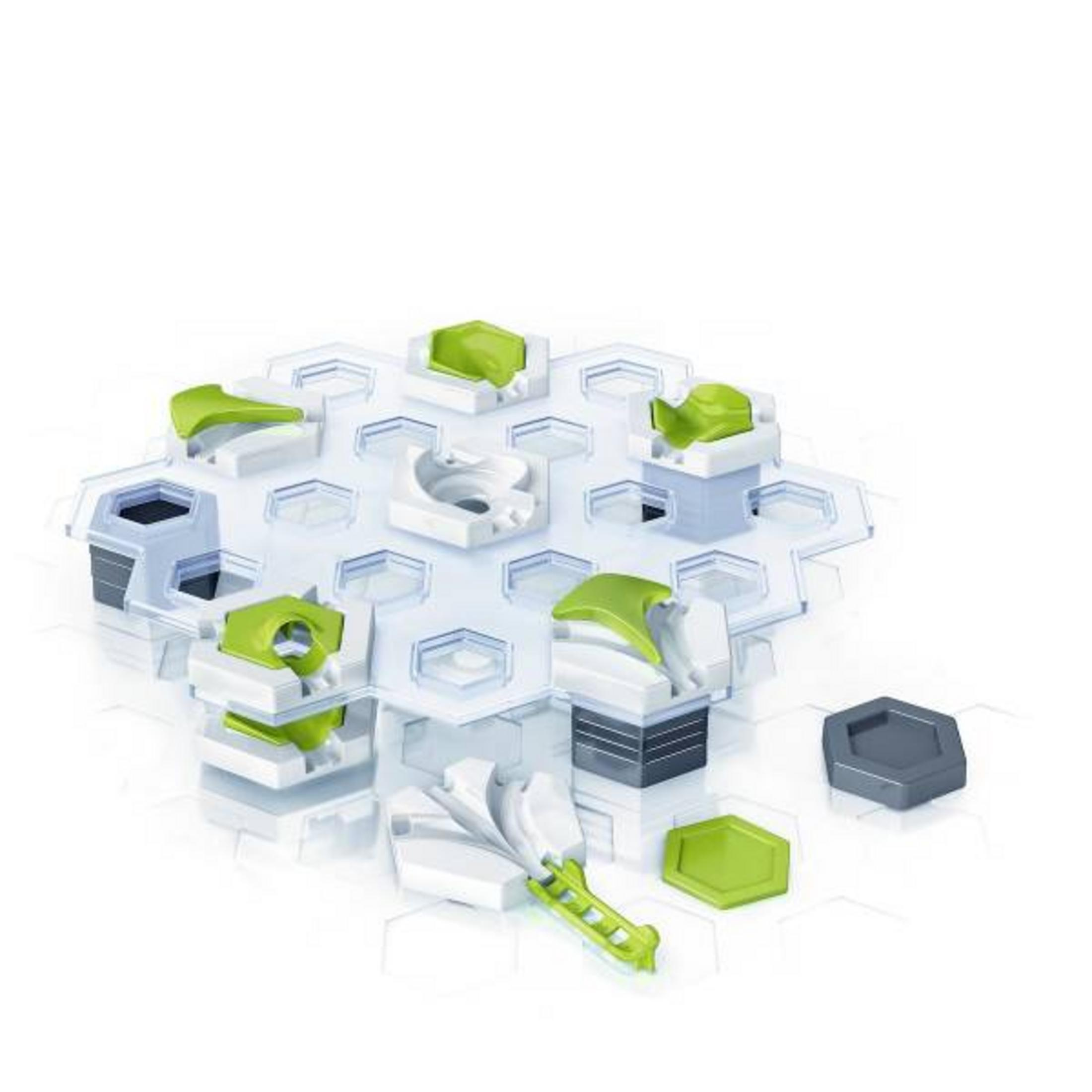 Un giocattolo da costruzione nei colori bianco e verde, con diversi pezzi e una base esagonale grigia. Bianco.